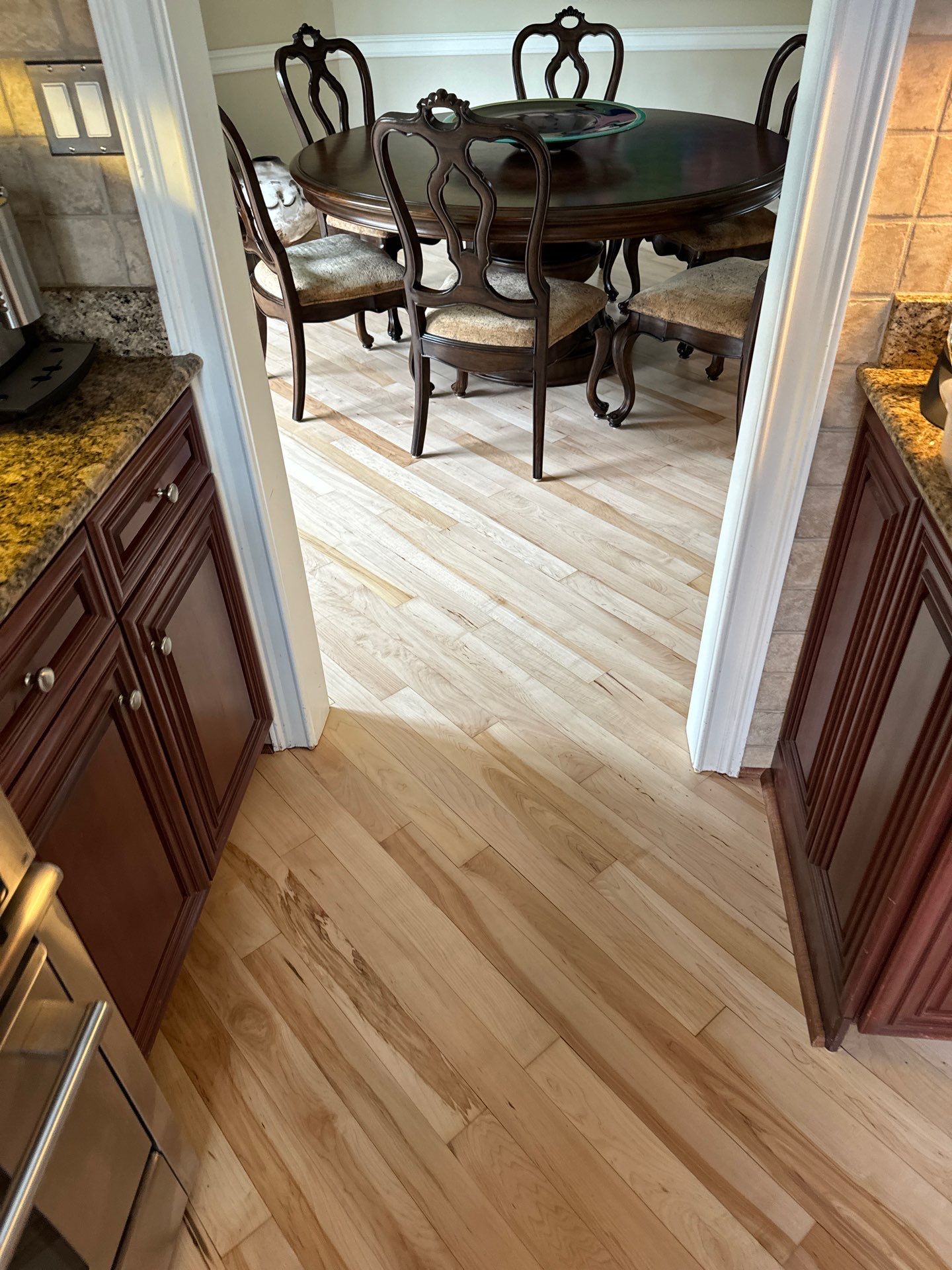 Prefinished Maple transformation by Ann Arbor Hardwoods 