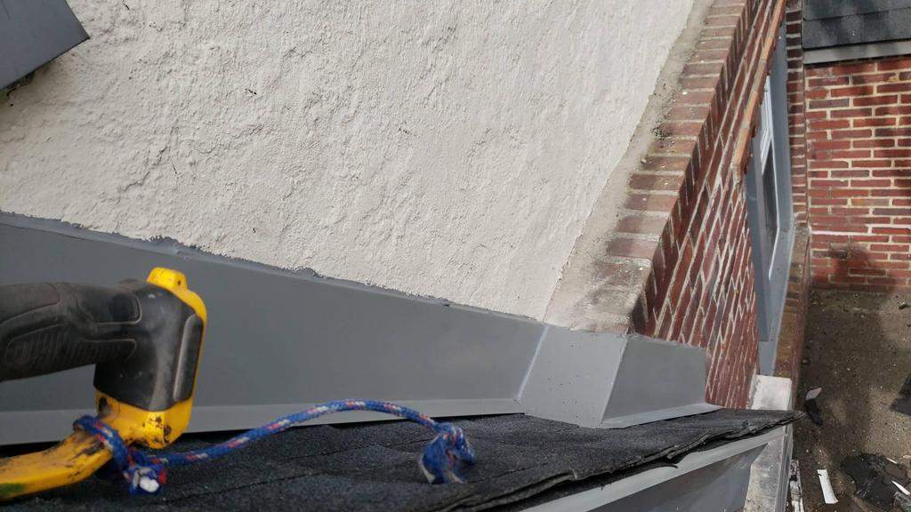 New Roof & Gutters by Island Roofing Inc.