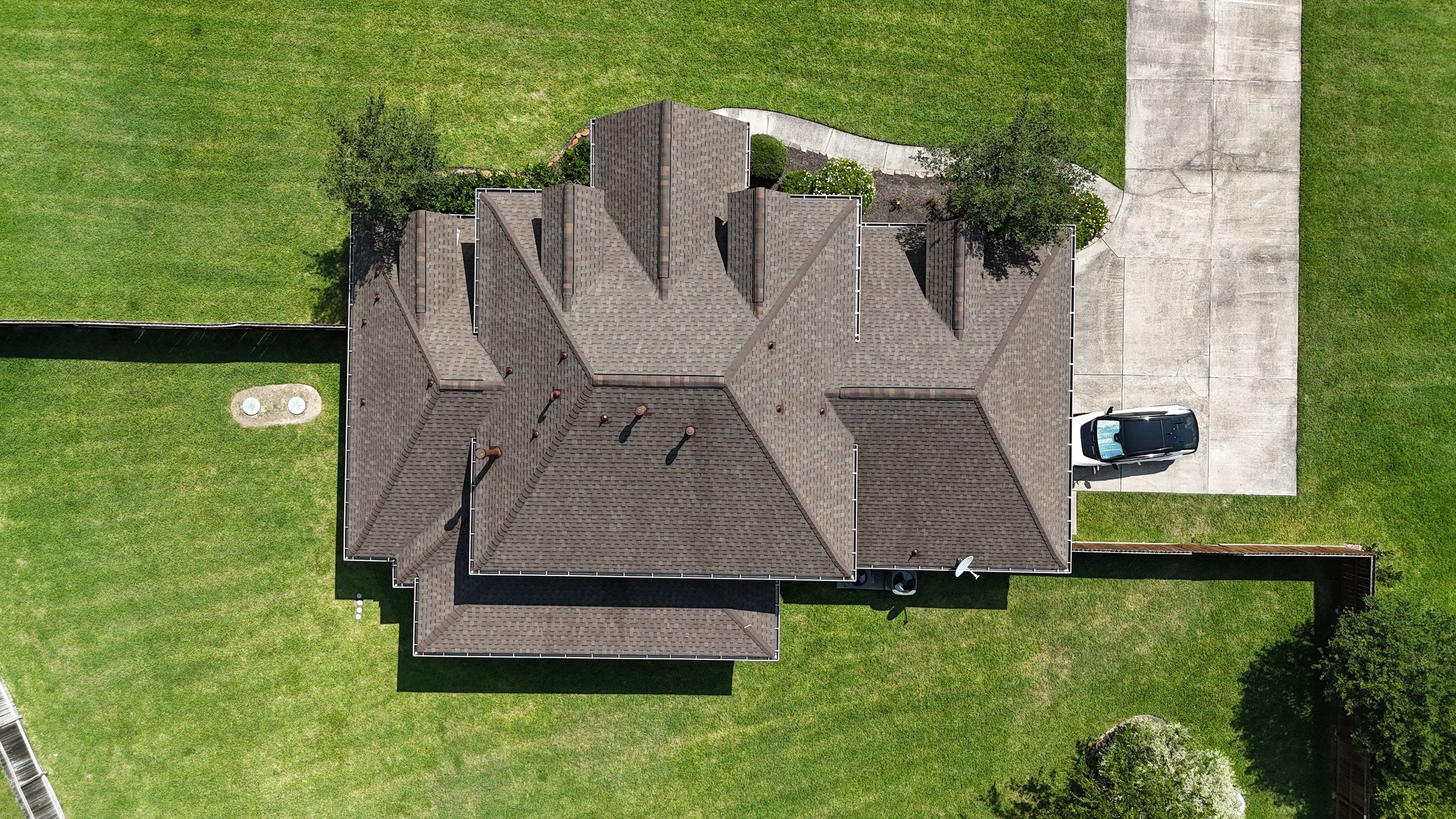 Huffman Roof Installation using Atlas Pinnacle Pristine by Modern BYLT Roofing & Construction