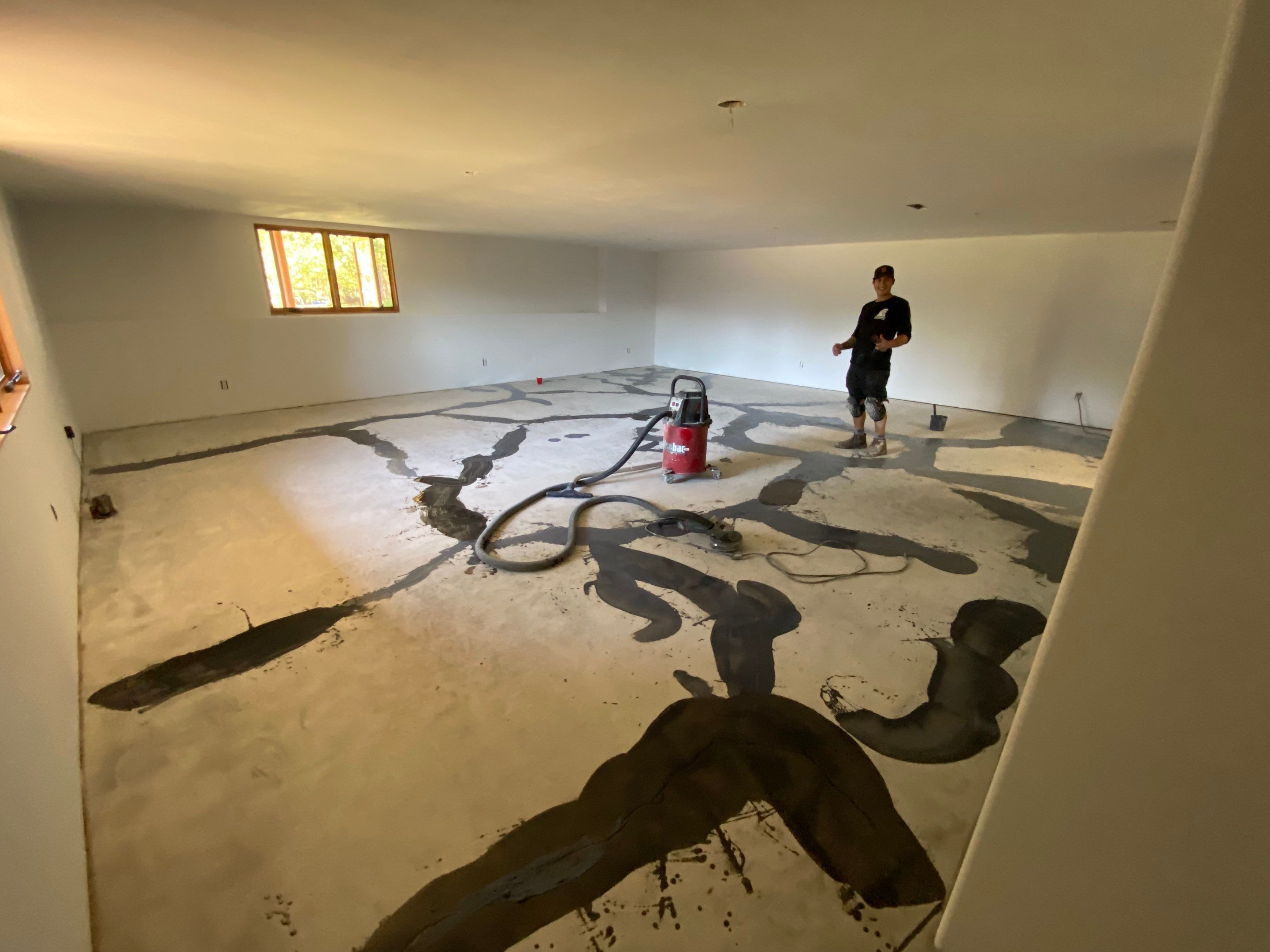 Basement Transformation using Pebble Beach by Croc Coatings, LLC
