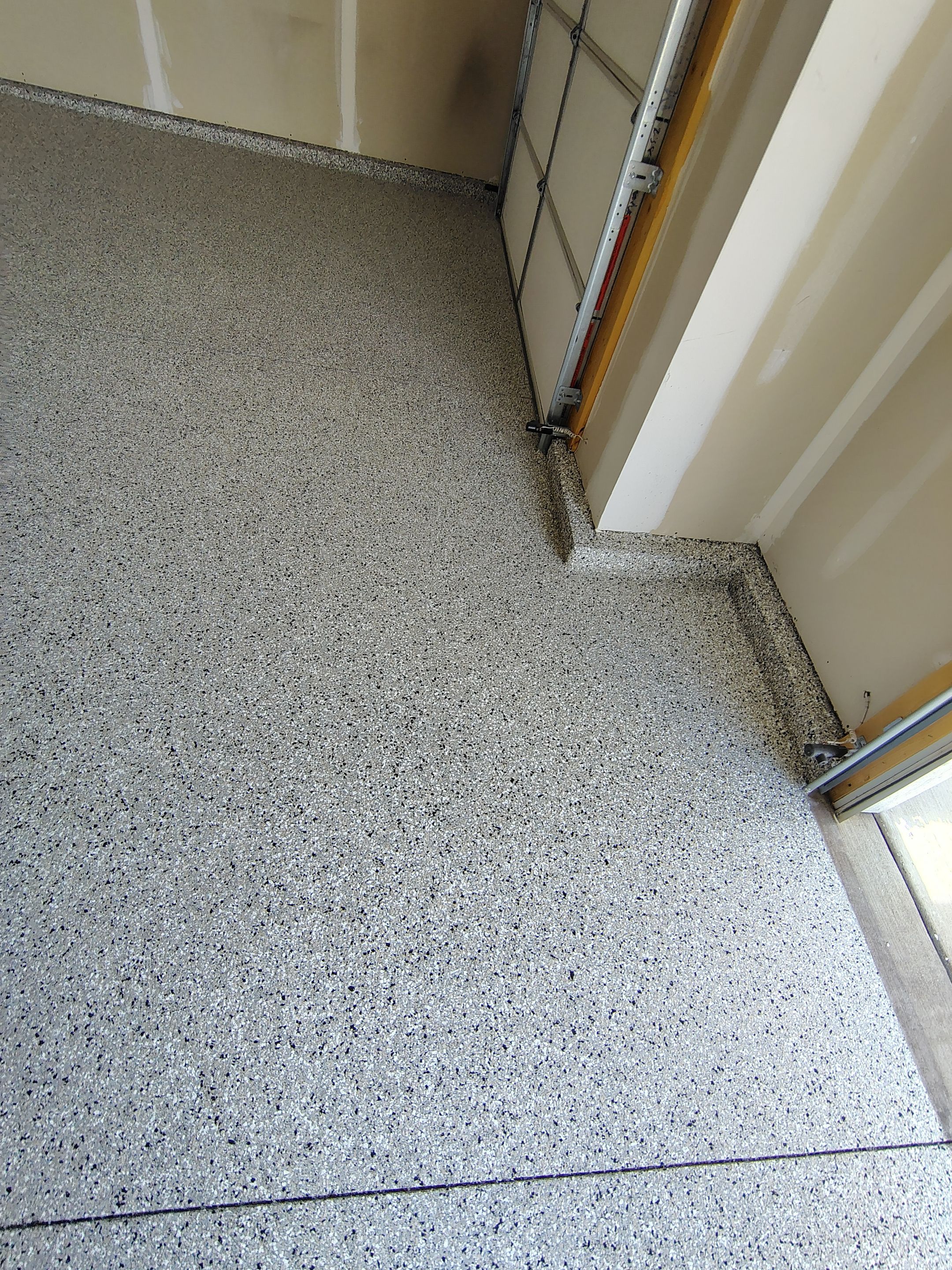 Epoxy Garage Floor Coating with Decorative Flake in Harrisburg by Select Painting, Coatings & Garage Cabinets