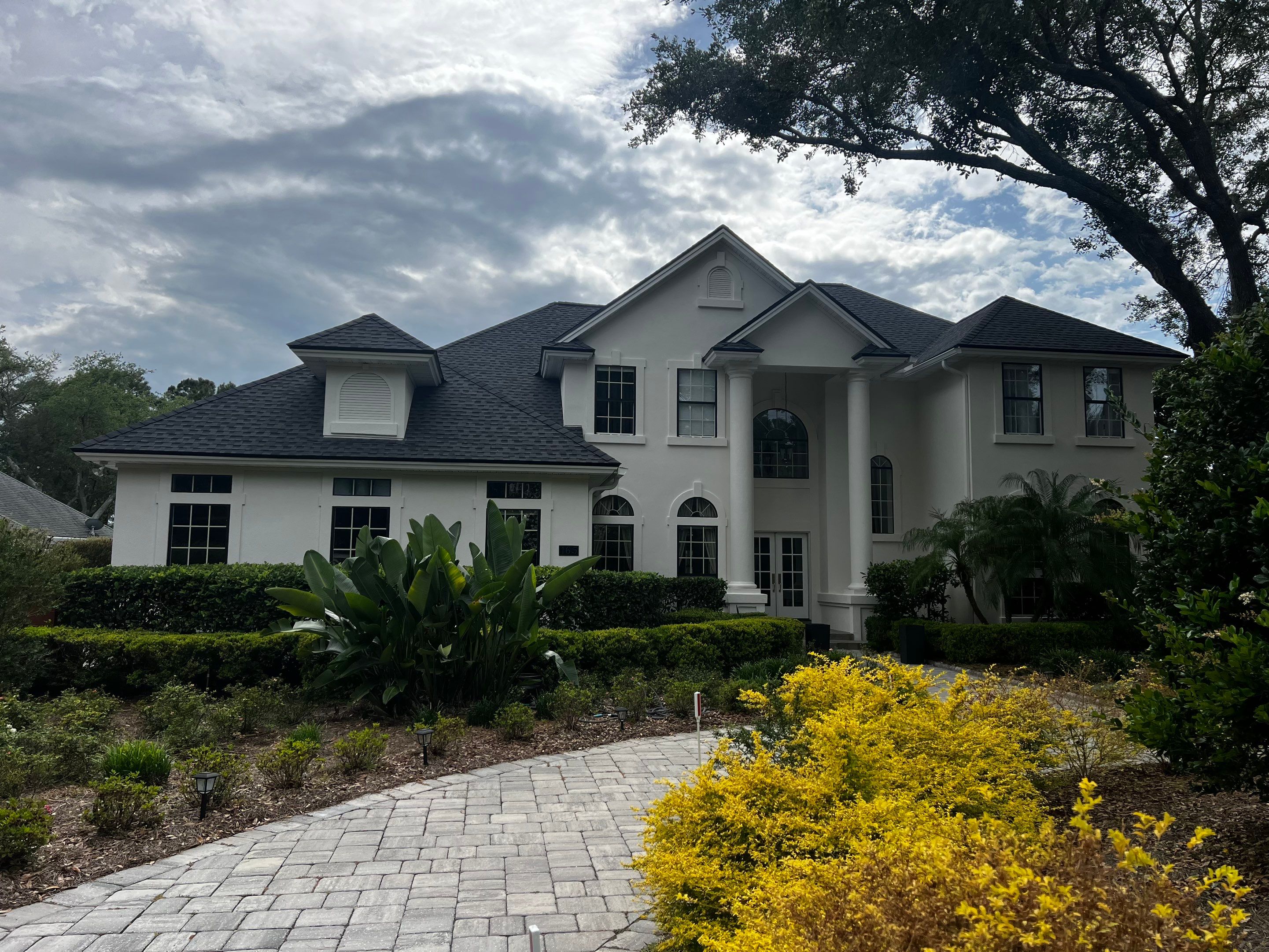 Large Stucco Home Exterior Painting in Marsh Landing | Ponte Vedra Beach, FL by A New Leaf Painting, LLC