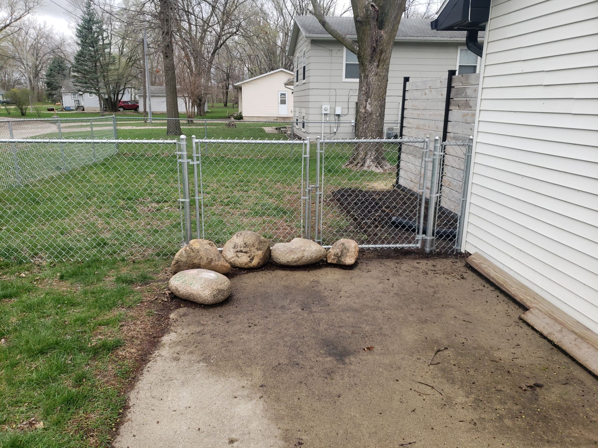 Galvanized Chain Link and Horizontal Wood Privacy Fencing in Waterloo by Perfect Picket Fence and Stain