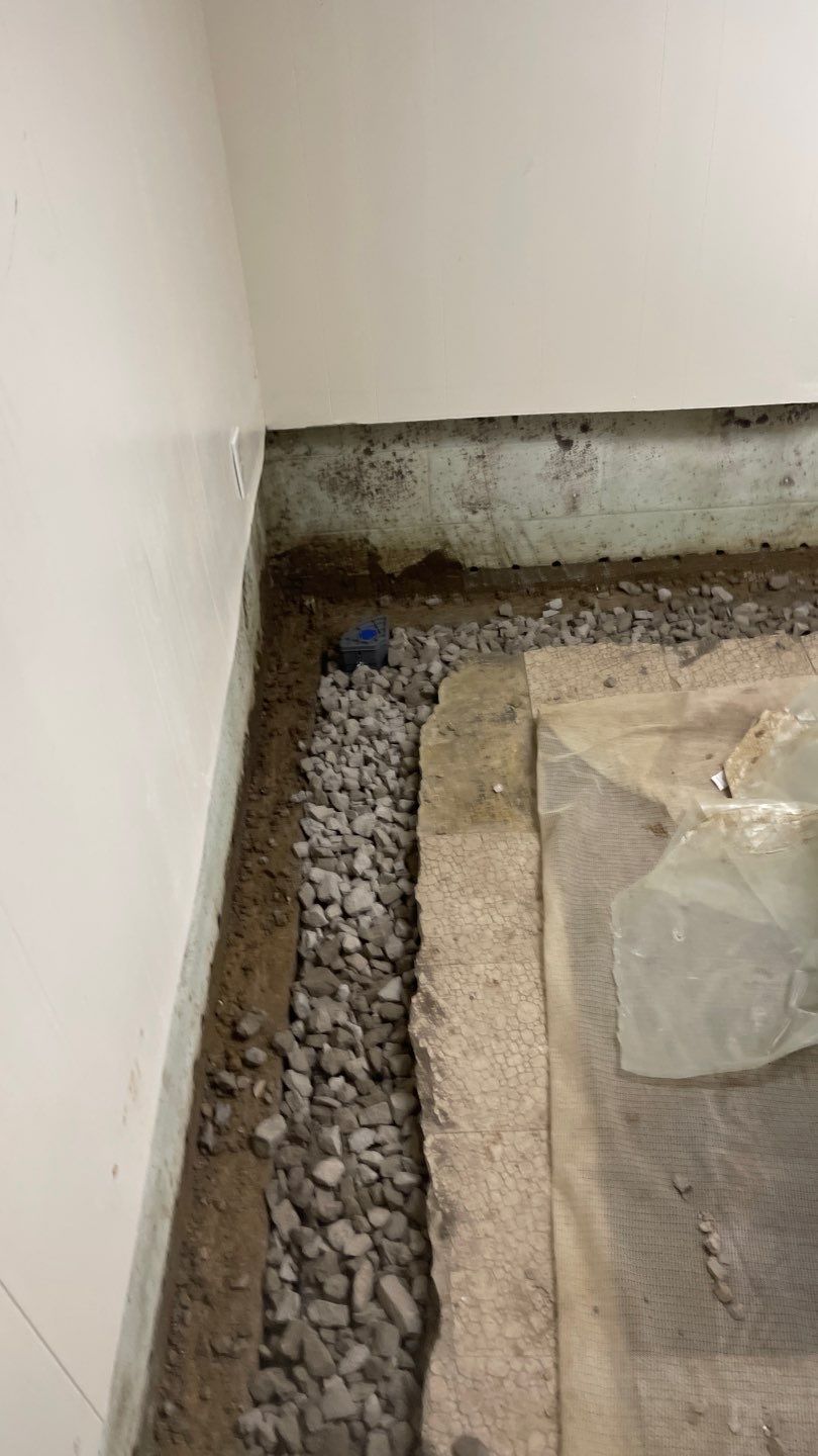 Interior Waterproofing Using GrateDrain™ Products by Toledo Basement Repair 