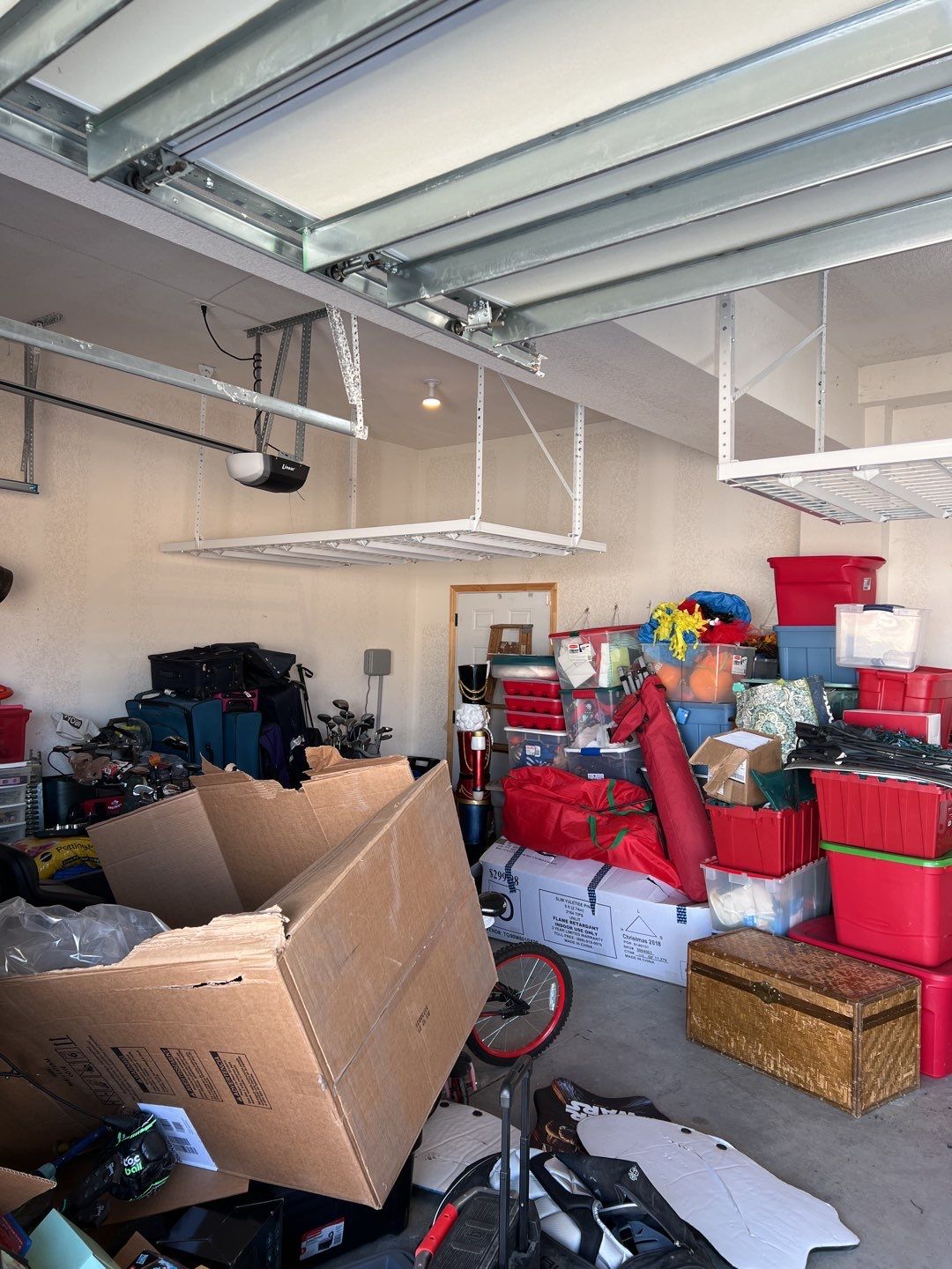 Ethan S. adds overhead racks to his garage!  by Banner Garage