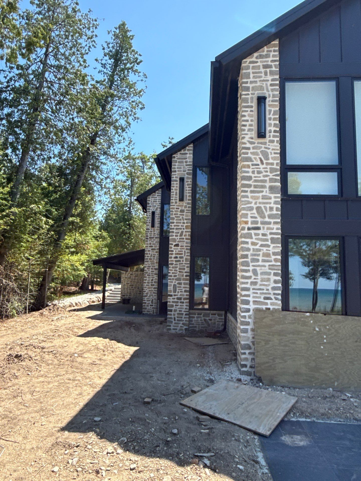 Gutter and Drainage System Installation for Modern Residential Build by Rainbow Seamless Systems