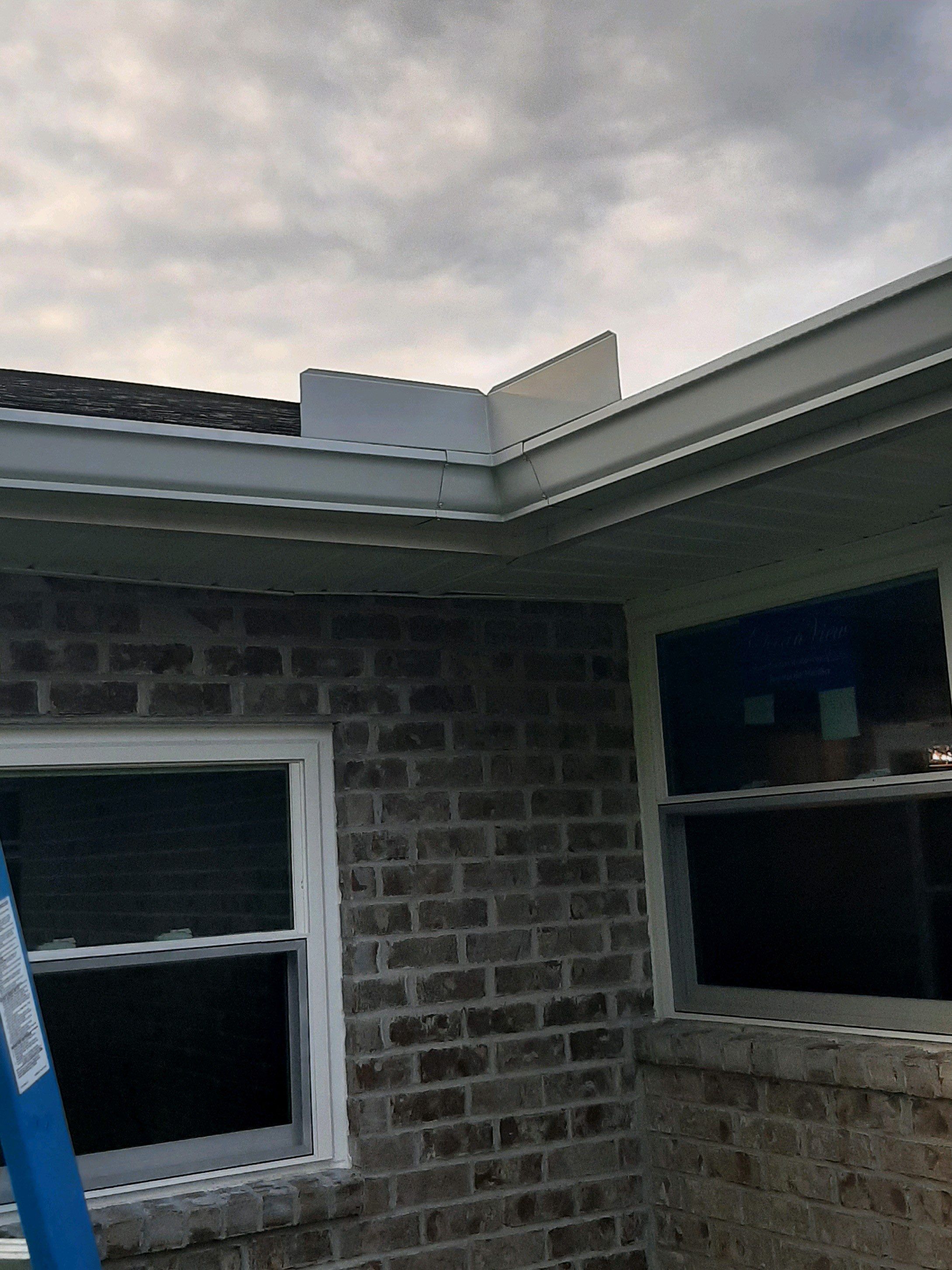 Seamless Gutter Installation using White K-Style Gutters by Gutter Professors