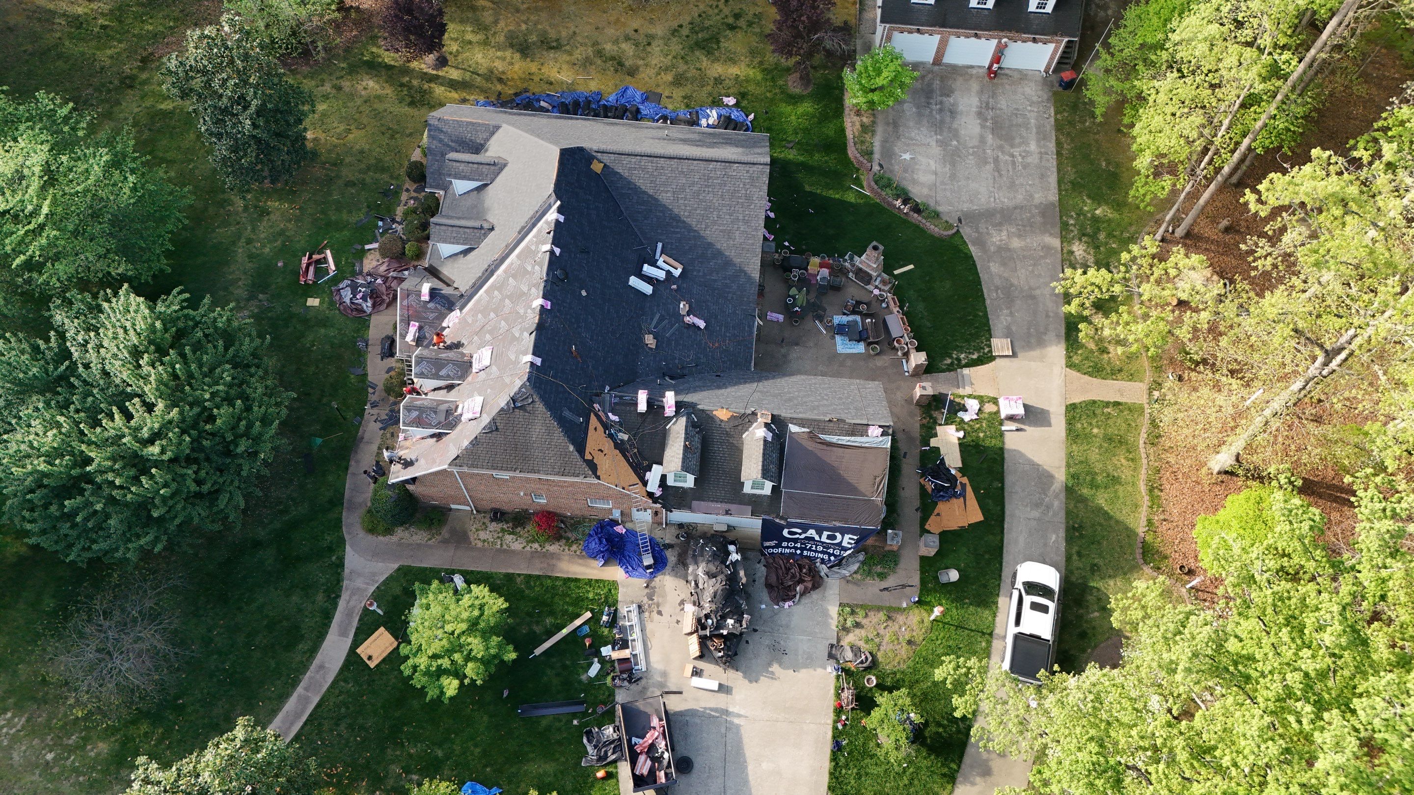 Comprehensive Roof and Gutter Replacement After Tree Damage in Midlothian by Cade Construction