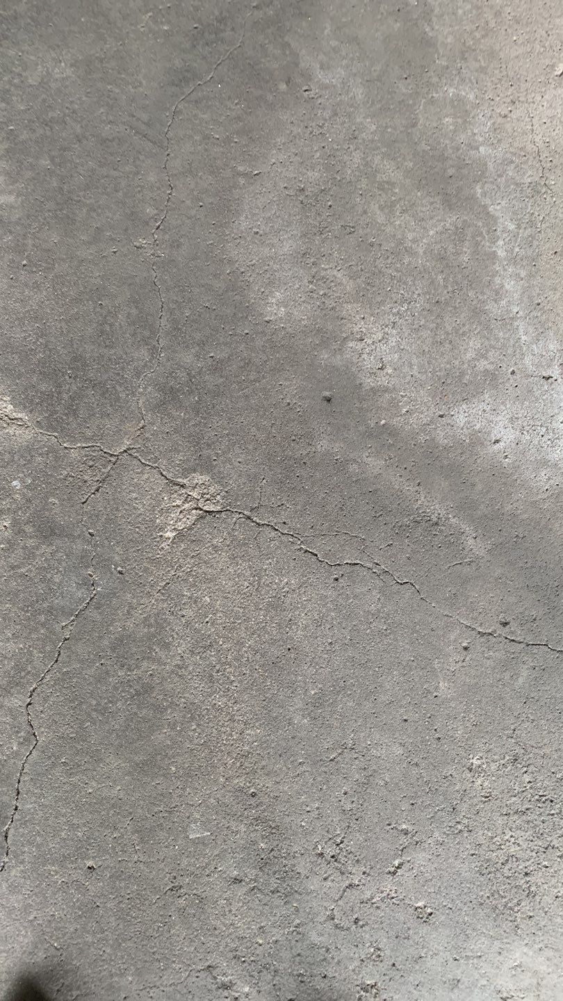 West Des Moines Garage and Patio Floor Coating using Pebble Beach Flakes by Revival Concrete Coatings