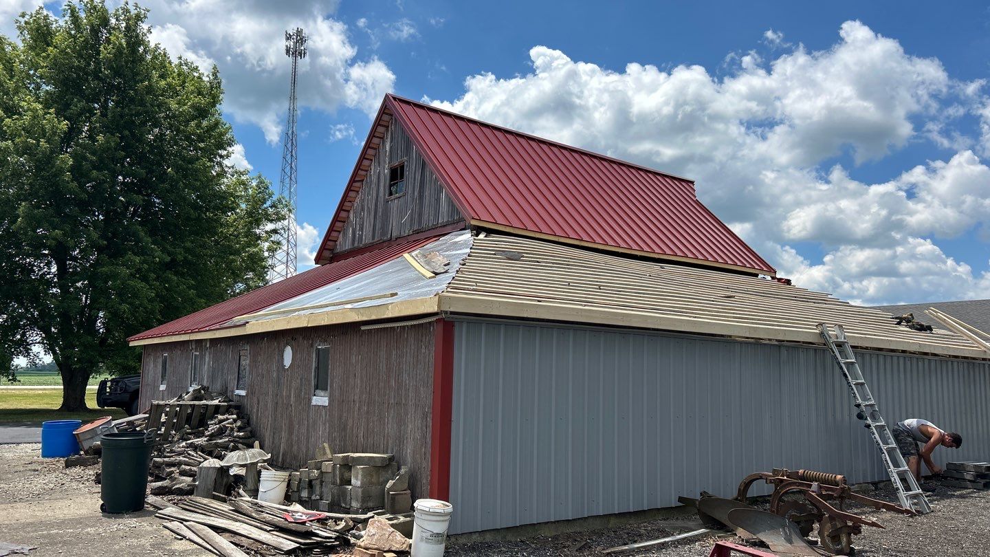 Residential Roofing Installation using Standing Seam Metal - Barn Red by RoofX 