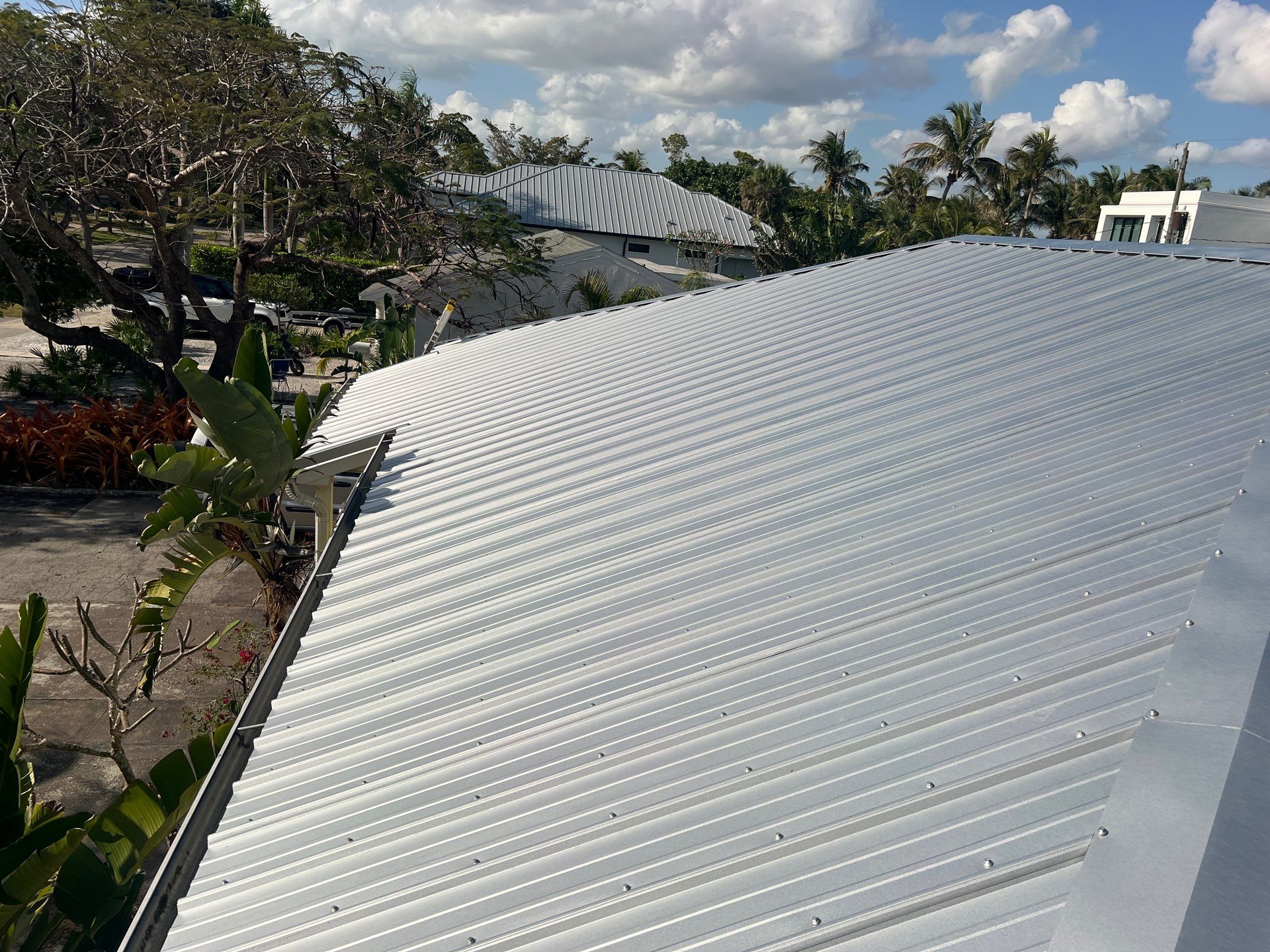 Residential Roofing Installation using Durabull Classic Rib Panel by Durabilis Roofing INC
