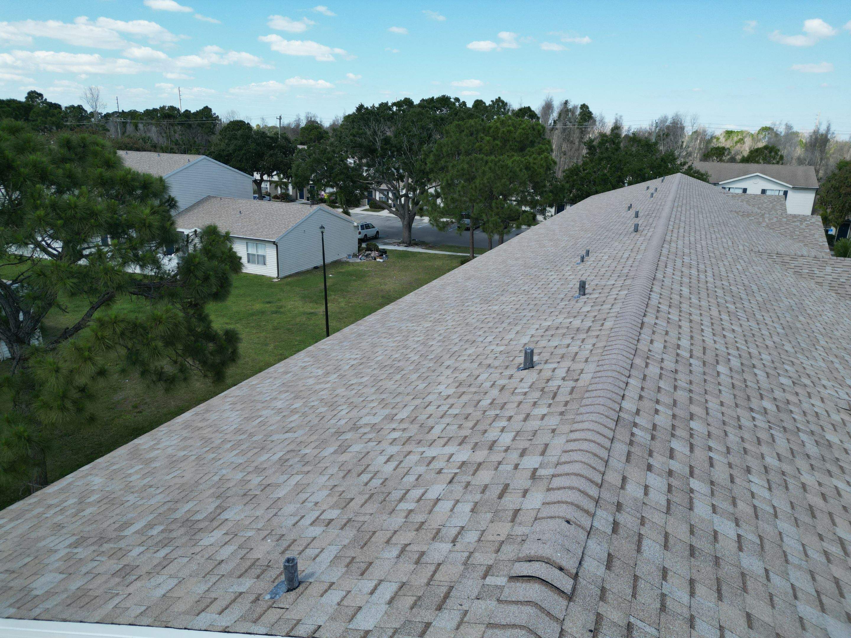 Apartment Complex Shingle Roof Replacement by Sailfish Roofing
