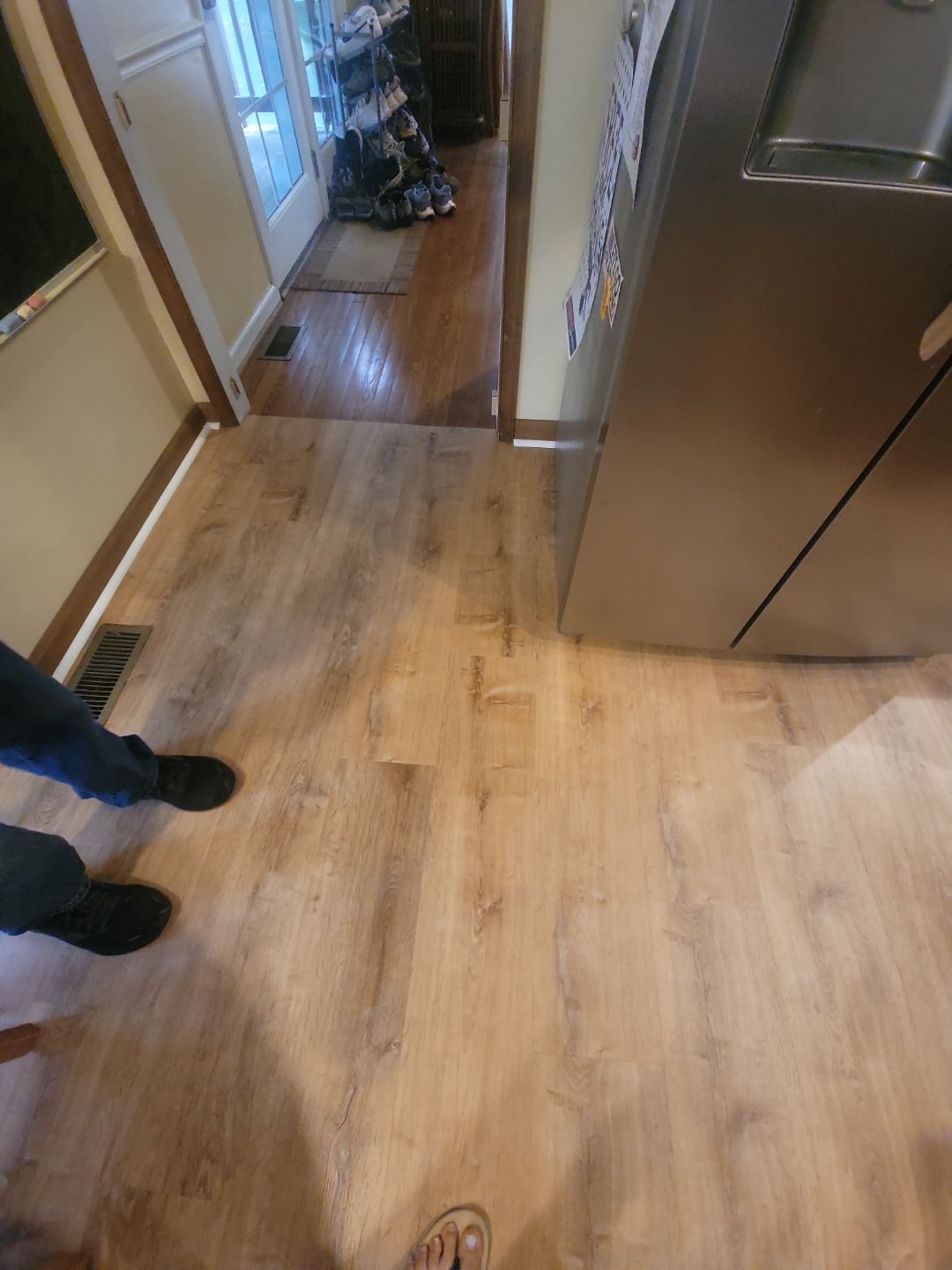 A Pathway to Personality – A Two-Tone Kitchen Transformation in Apex by Elite Remodeling and Design LLC