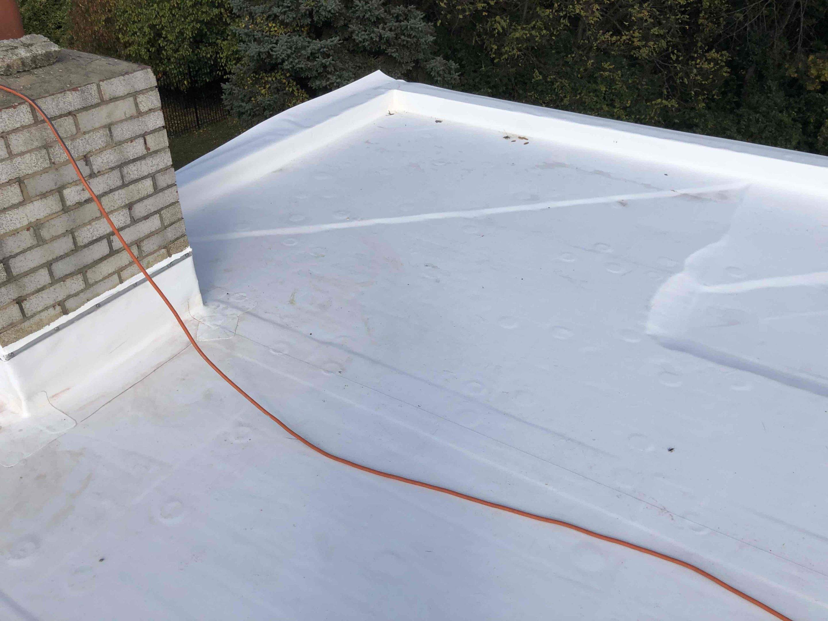 Roof Installation using Silicone TPO by ExteriorPros