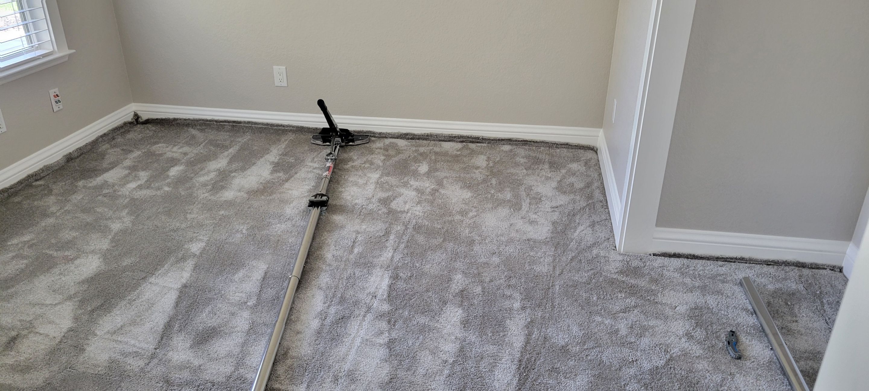 Stretching Out a Buckled Carpet by Ardent Carpet Restore LLC