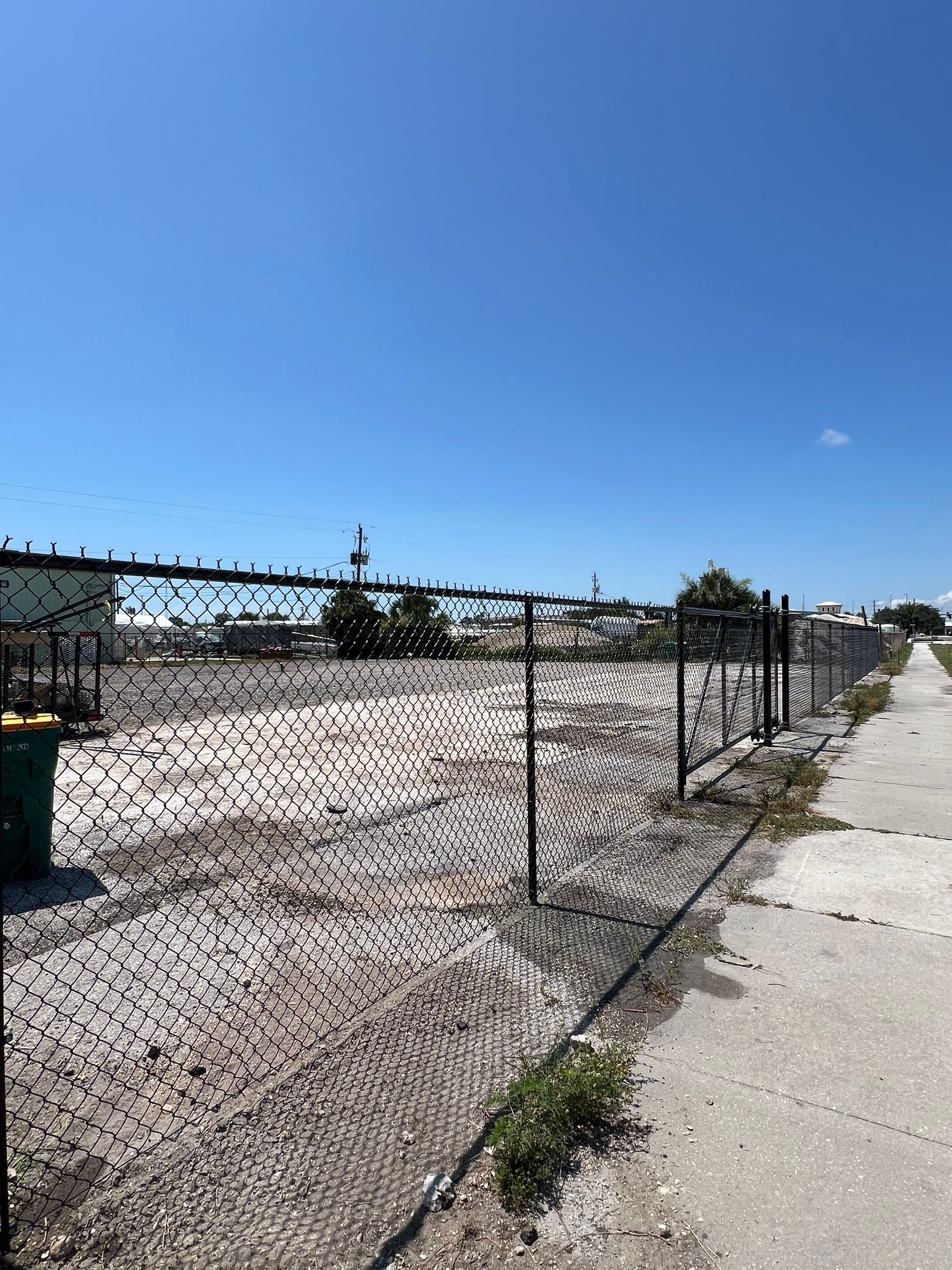 Chain-link Fence Installation using 6ft Black Chain Link Fence  by Asap fence and gates, LLC