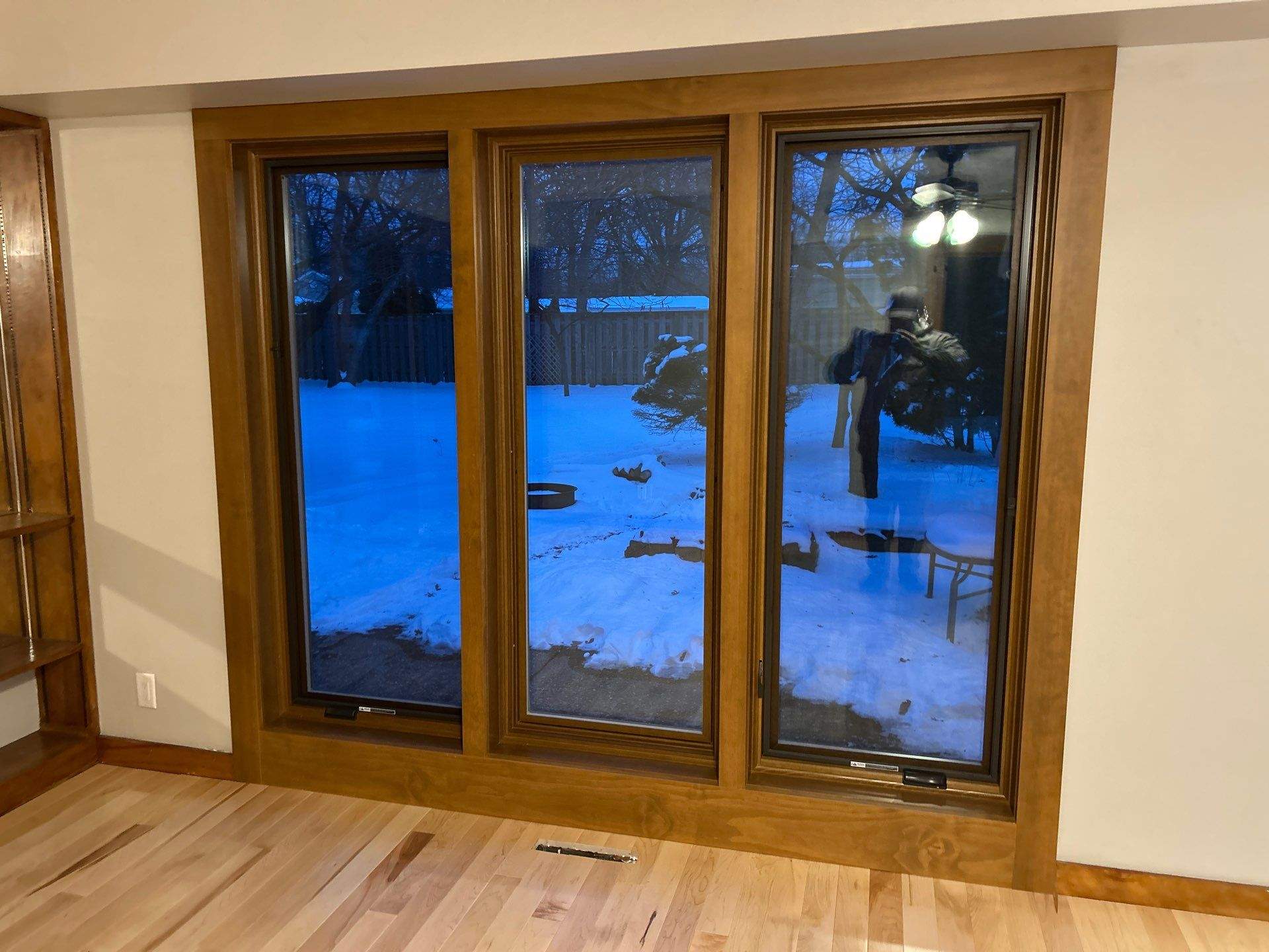 Black-Frame Pella Lifestyle Upgrade on a Partial Brick Home by United Windows and Siding LLC