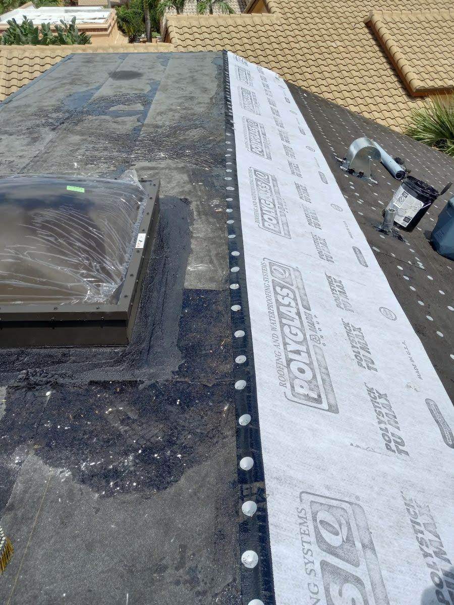 Complete Chimney Rebuild + Tile & Flat Re-Roof  by Morton Roofing, Inc.