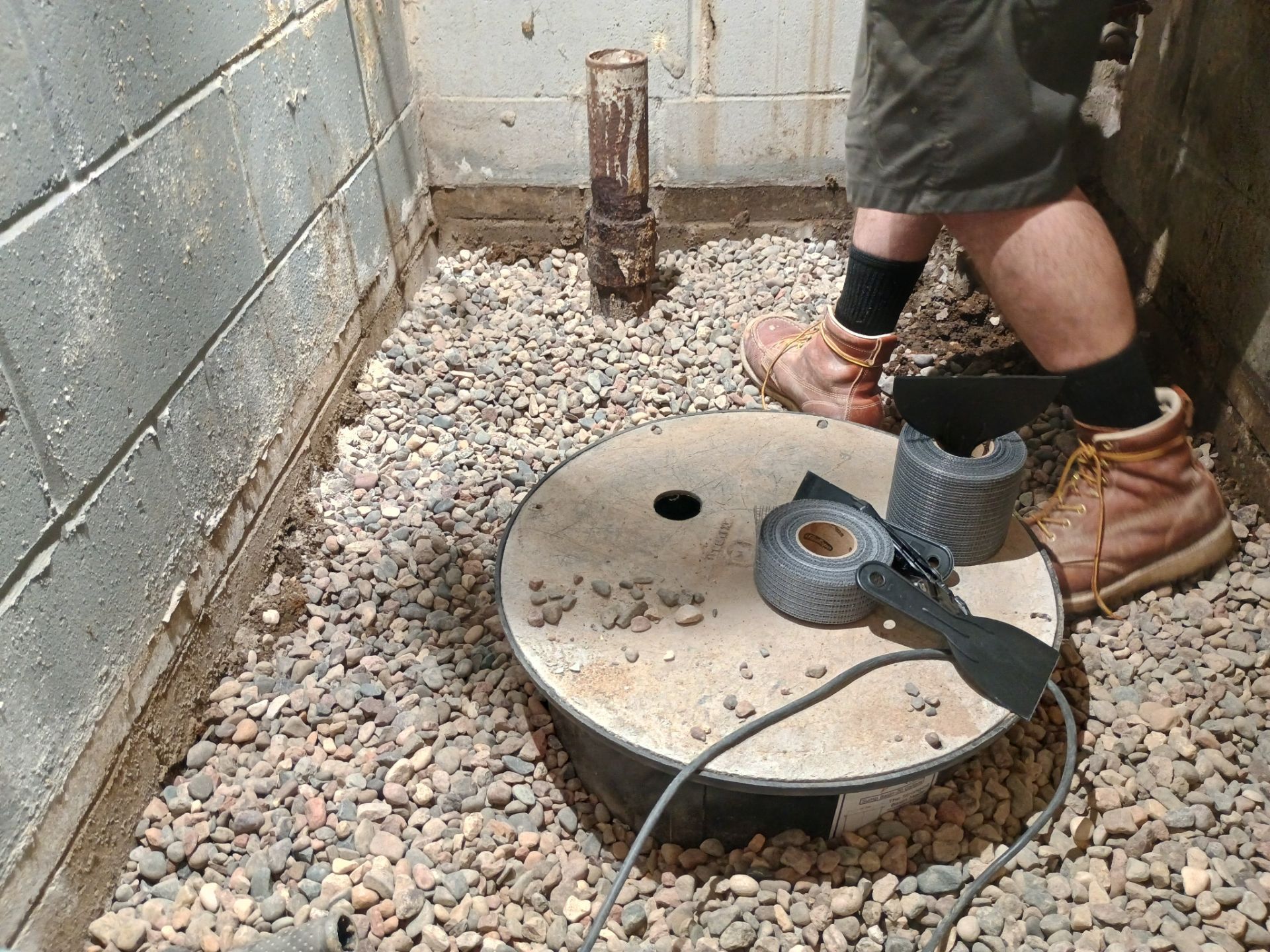 Interior Drain Tile & Sump Pump System in West Minneapolis by Waterproofing Northeast