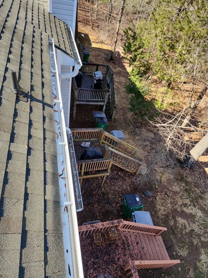 Gutter Cleaning using water by Power Wash Masters LLC