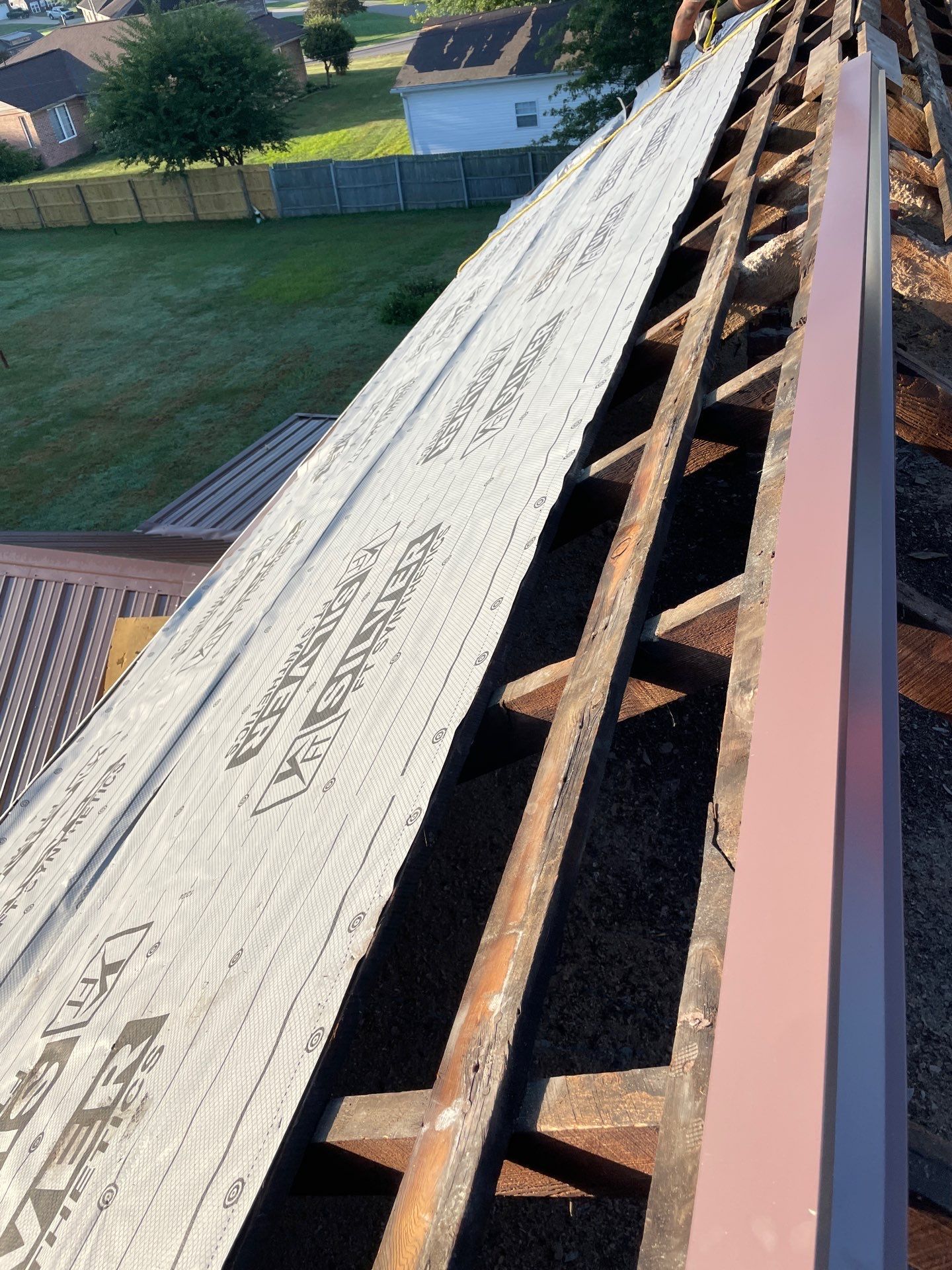 Residential Roofing Installation using Metal by Rainstoppers Roofing