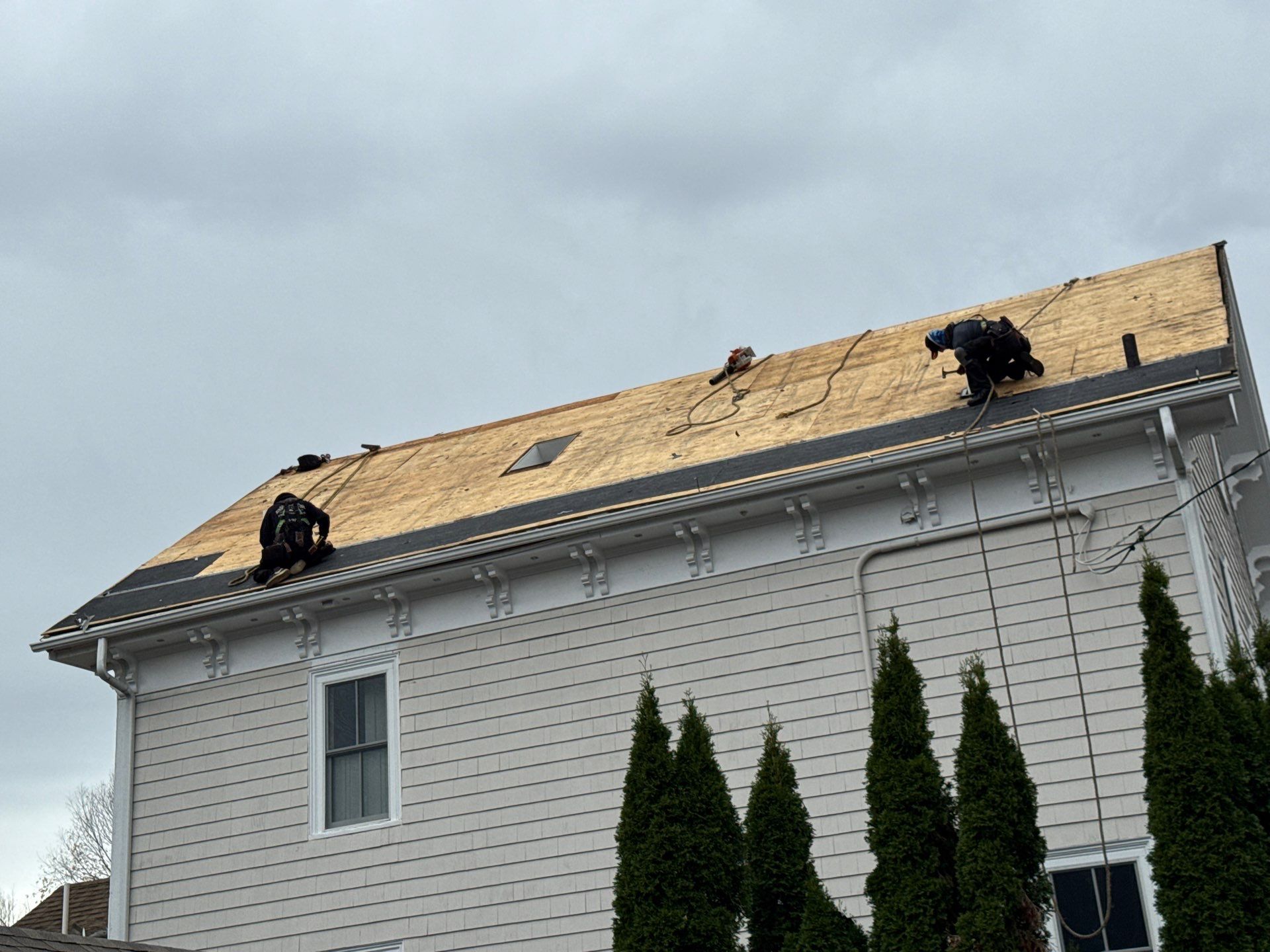 Newburyport Complete Roof Replacement with Solar Venting Skylight by Mighty Dog Roofing of Greater Middlesex County