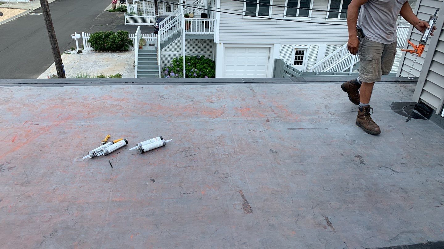 Deck Installation using trex over epdm roof by A Plus Exterior