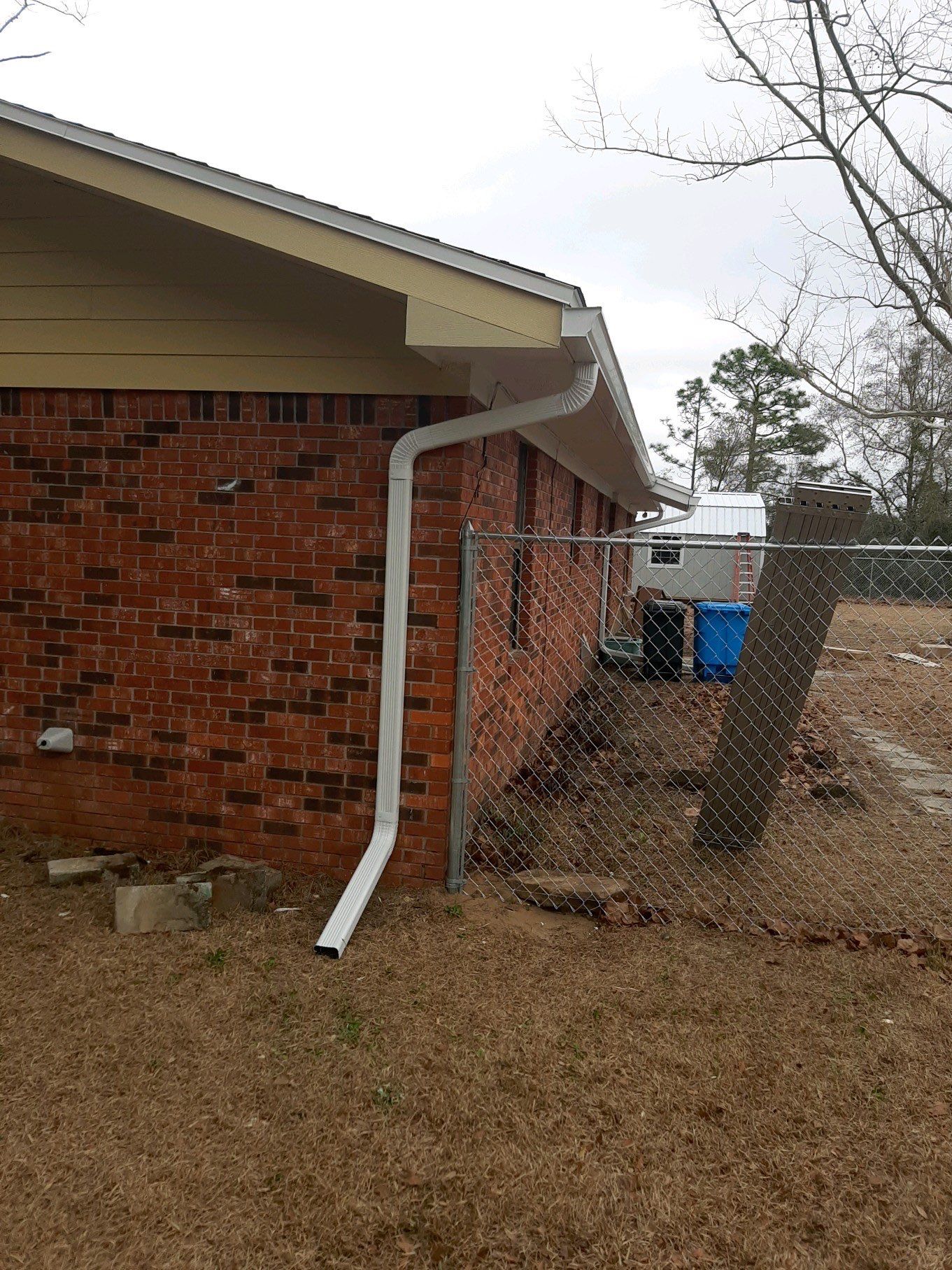 Gutter Installation using White Seamless Gutters by Gutter Professors