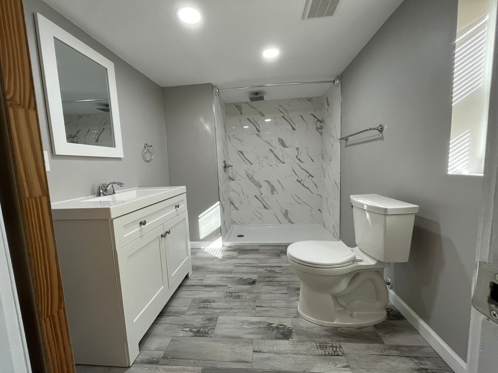 Bathroom Remodel using Tile by Home Concepts Construction