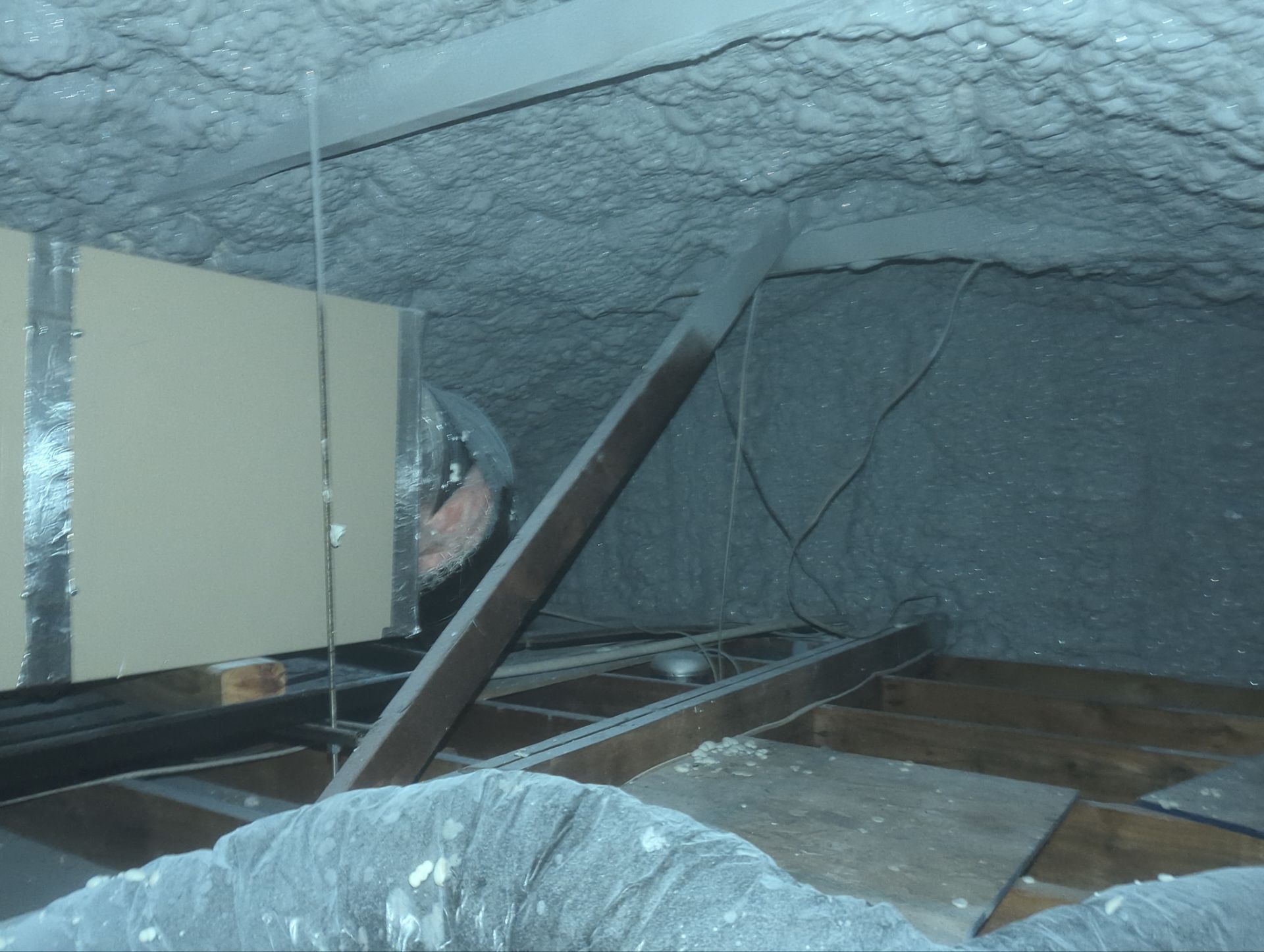 Attic Retrofit using open cell spray foam by NYS Foam & Energy