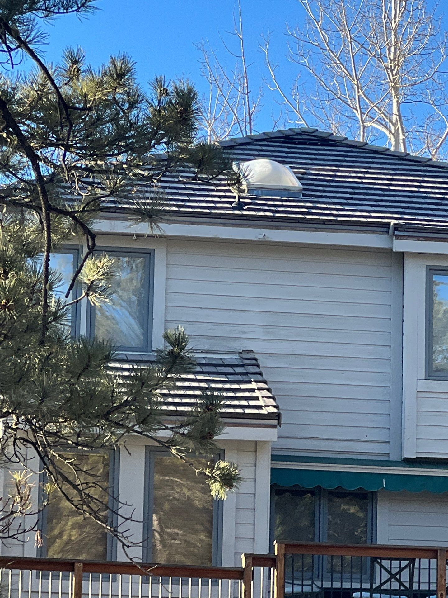 Residential Roofing Installation using Concrete Tile by Blue Peaks Roofing LLC 