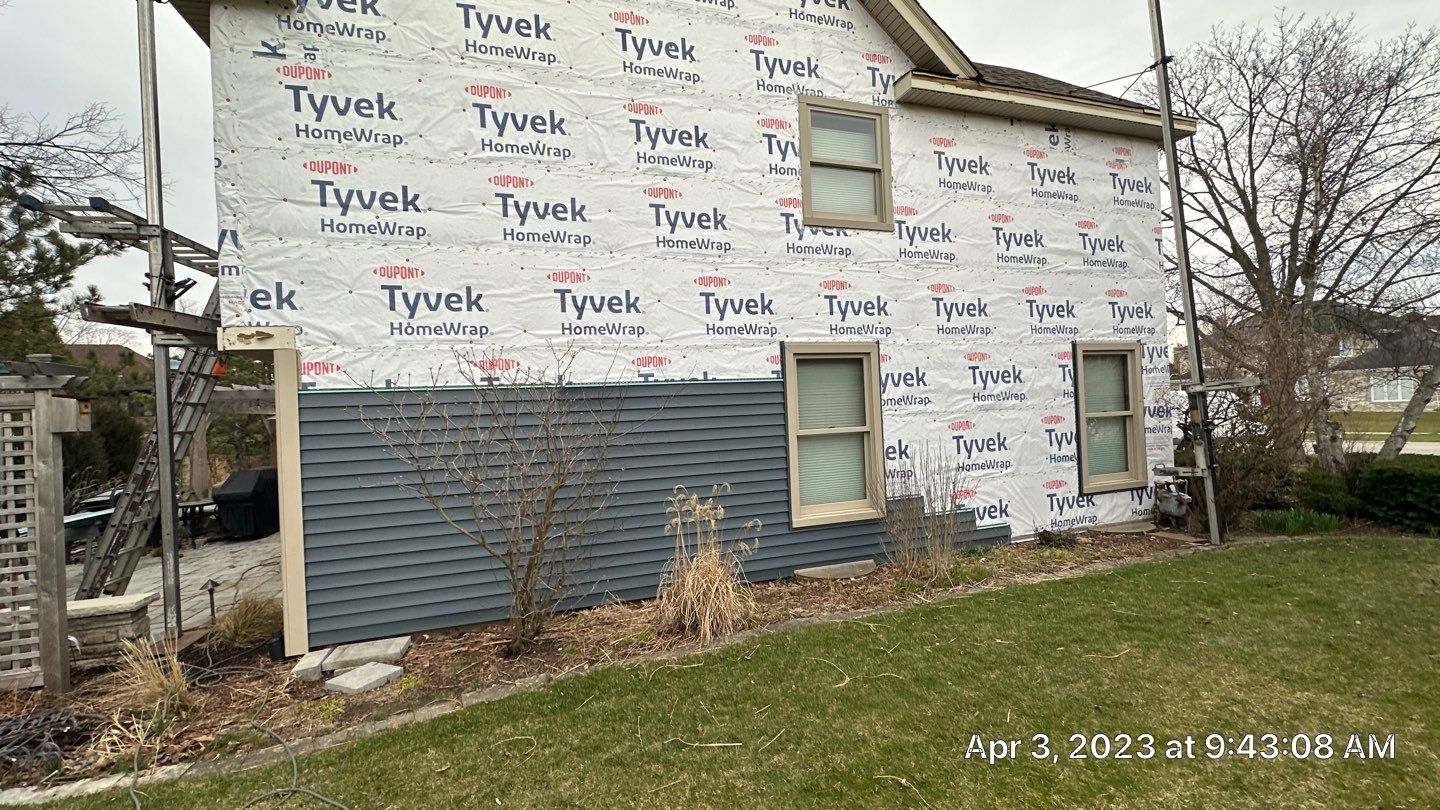Siding Installation using Alside Charter Oak by Pro Home Services Inc