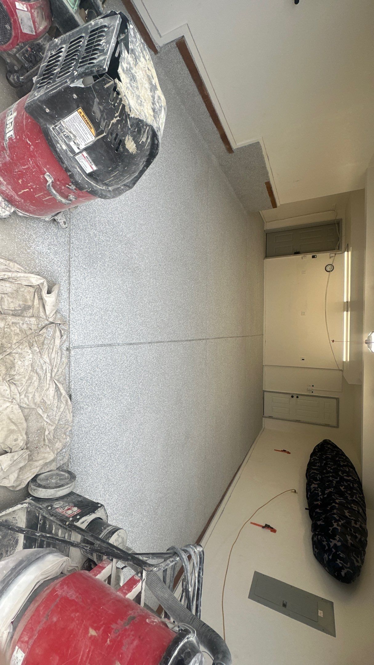 Garage Transformation using 1/8 Tidal Wave by Croc Coatings, LLC