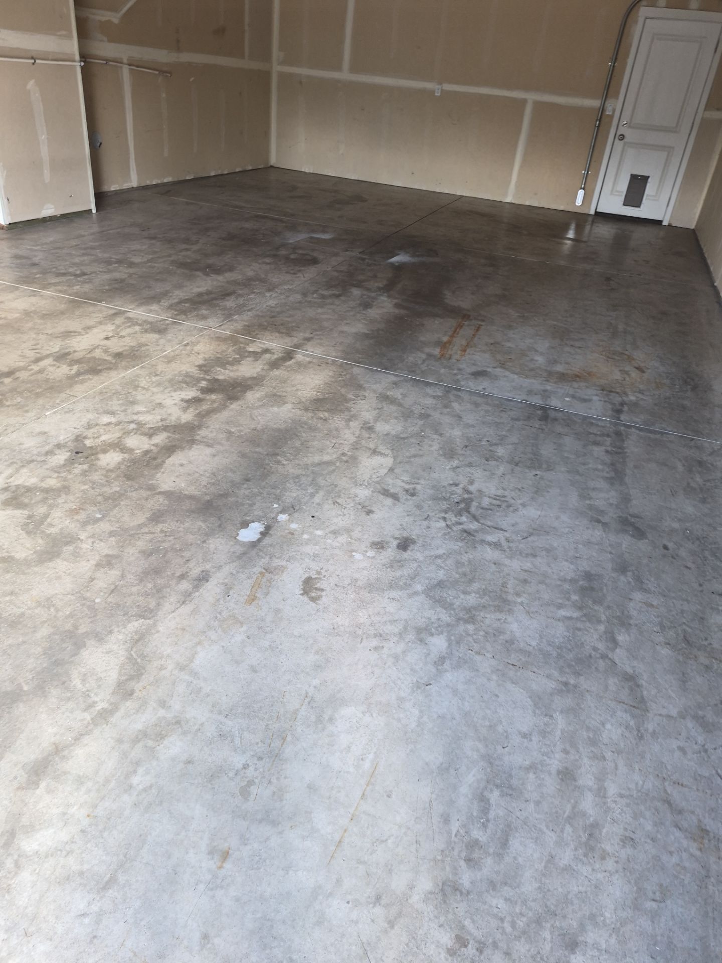 Garage Floor Coating Installation in Post Falls with Canfield Hybrid Flakes by Croc Coatings, LLC