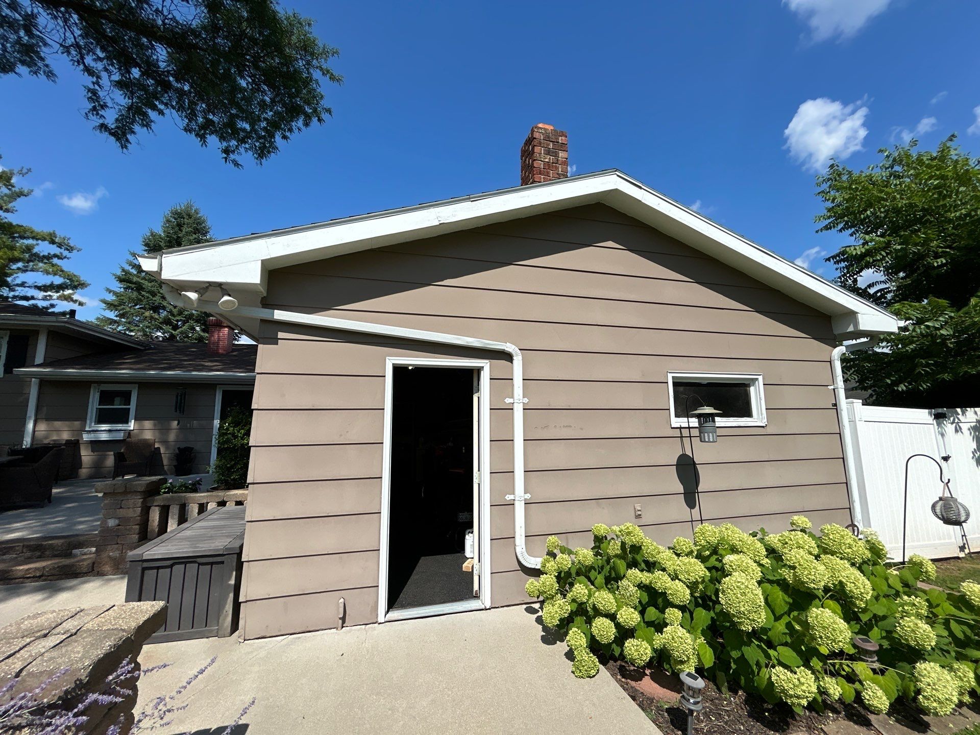 Full Exterior Siding and Gutter Replacement in Green Bay by Wisconsin Exteriors
