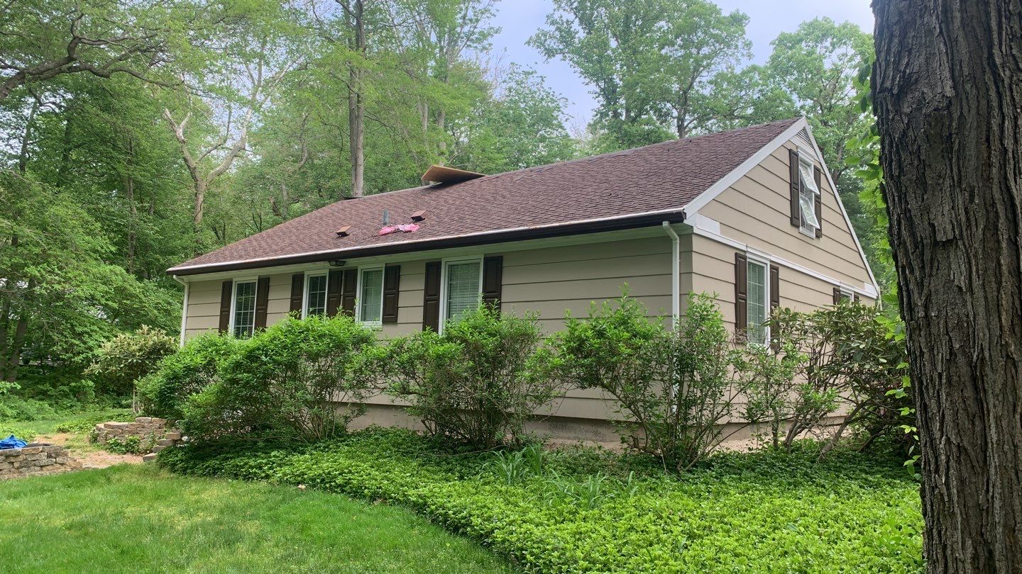 Commercial Roofing Installation using Owens Corning Duration Driftwood by A Plus Exterior