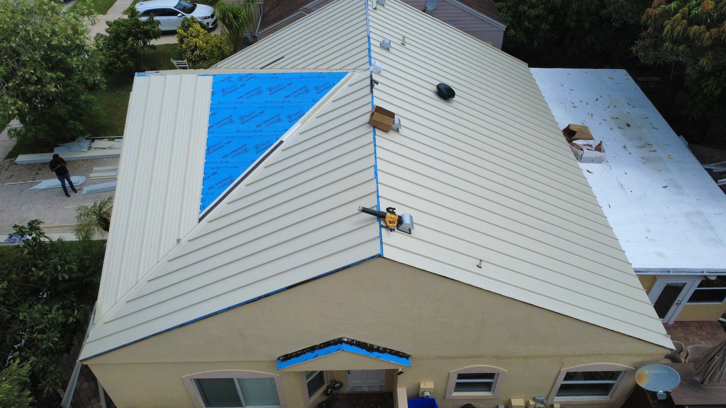 Residential Roofing Installation using 1.5'' Mechanical Seam by BLUES BROTHERS ROOFING