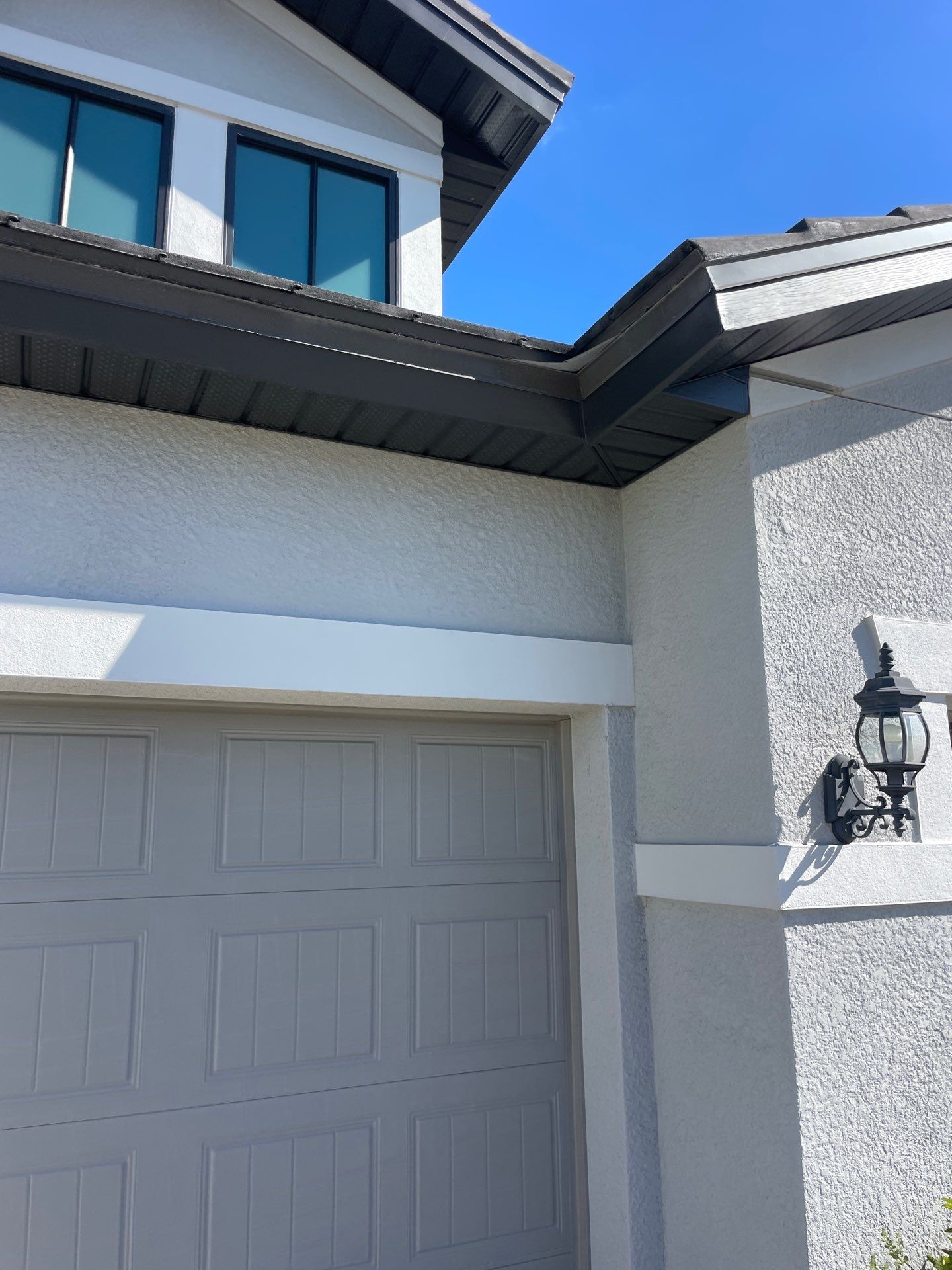 Black Seamless Gutters in Fort Myers FL by Gutter Professors