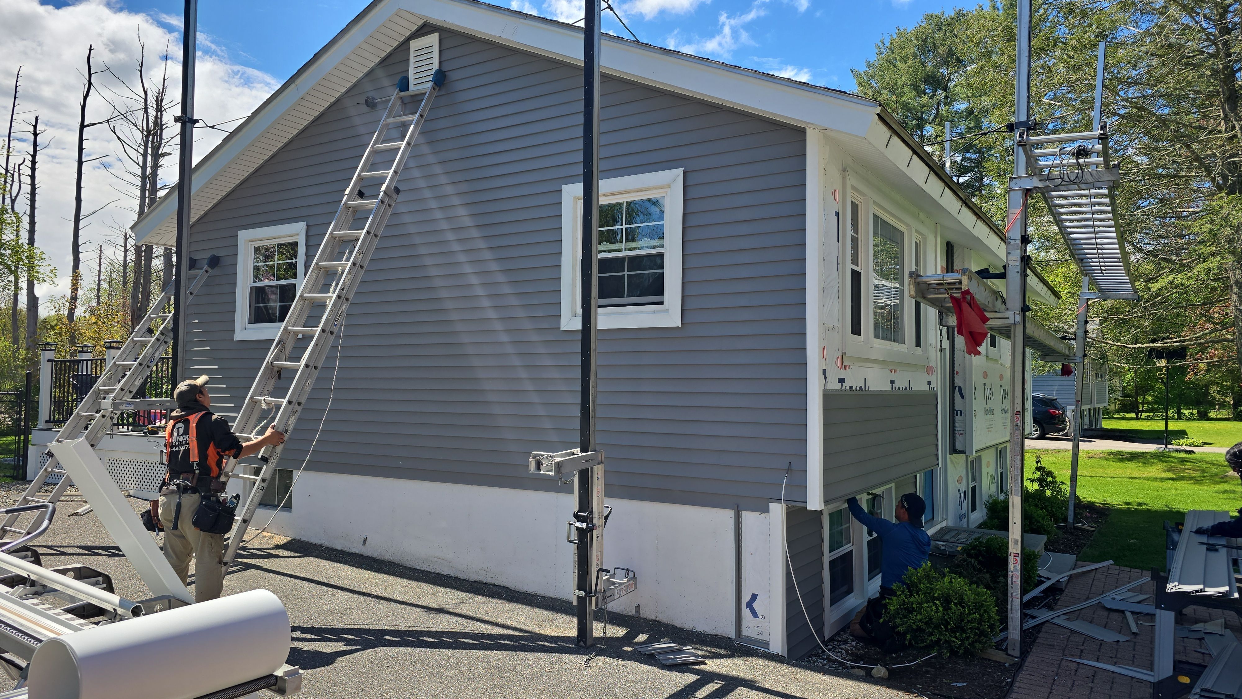 Siding and door replacement in Holliston, MA by UBrothers Construction