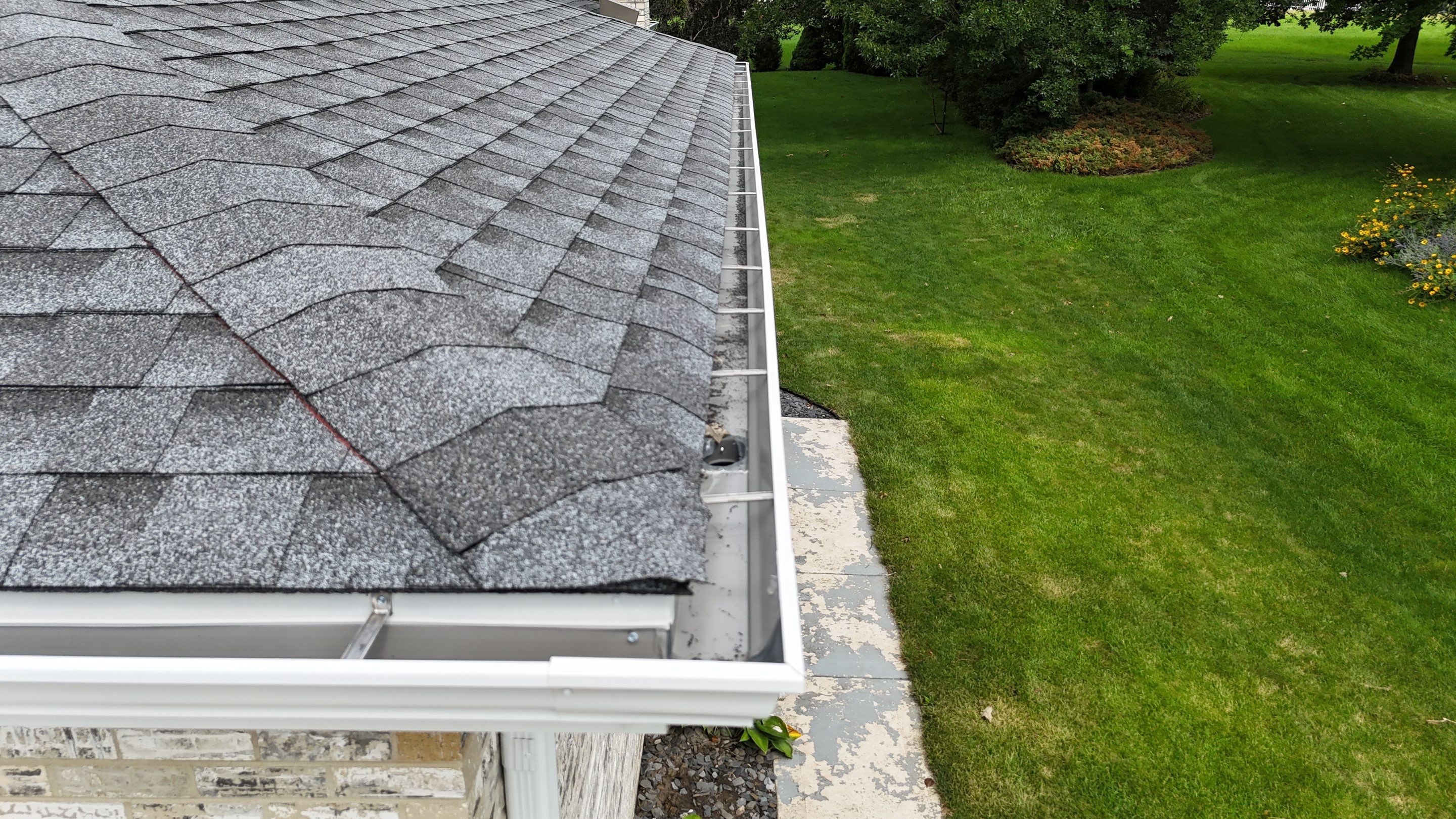 Roof and gutters replacement by Optimal Home Improvement 