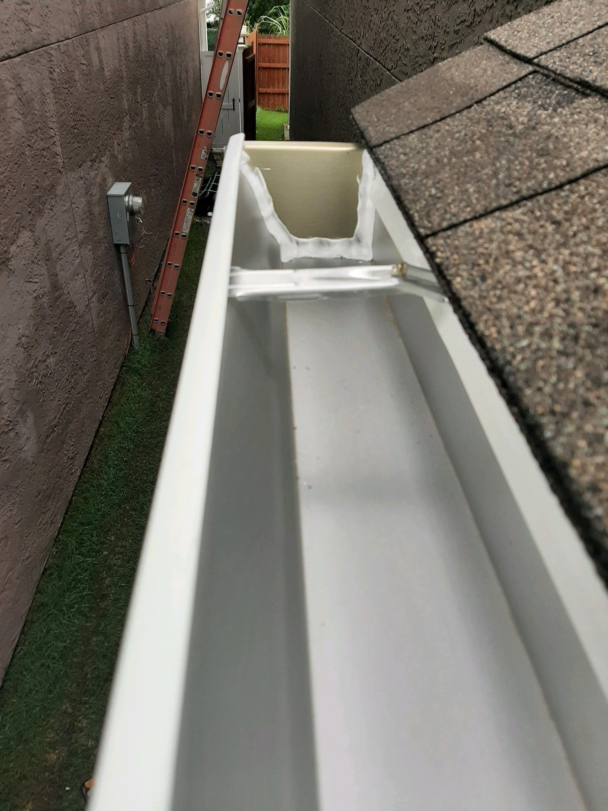 Seamless Gutter Installation using White K-Style Gutters by Gutter Professors