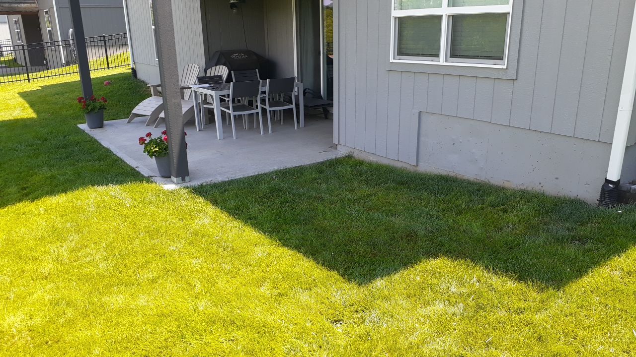 Back Yard Paver Patio by LAND ESCAPES LLC