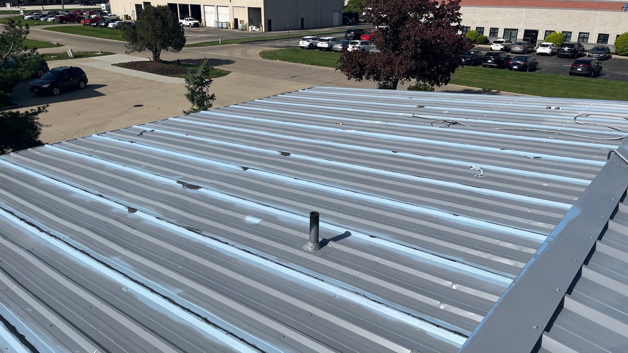 Berea Ohio Metal Roof Coating by Gold Star Roofing LLC 