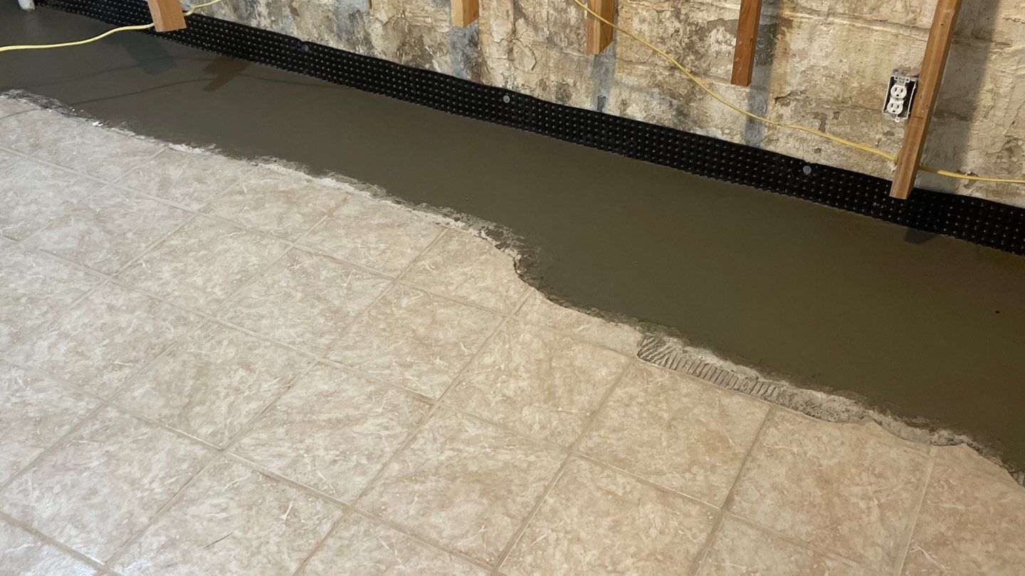 Drain Tile in Minneapolis for Kristen & Taylor by Waterproofing Northeast