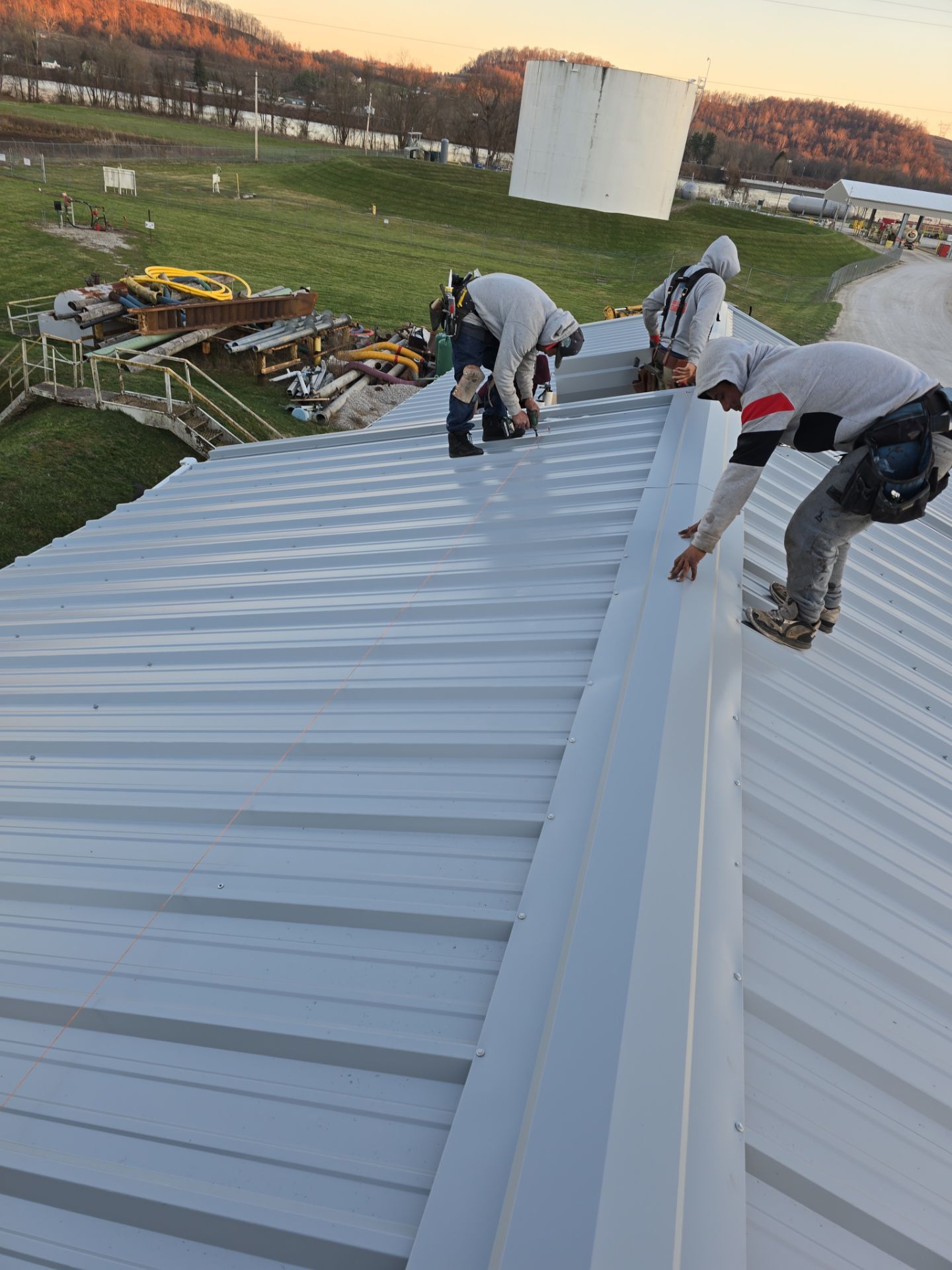 Commercial Roofing Installation using Metal by Rainstoppers Roofing