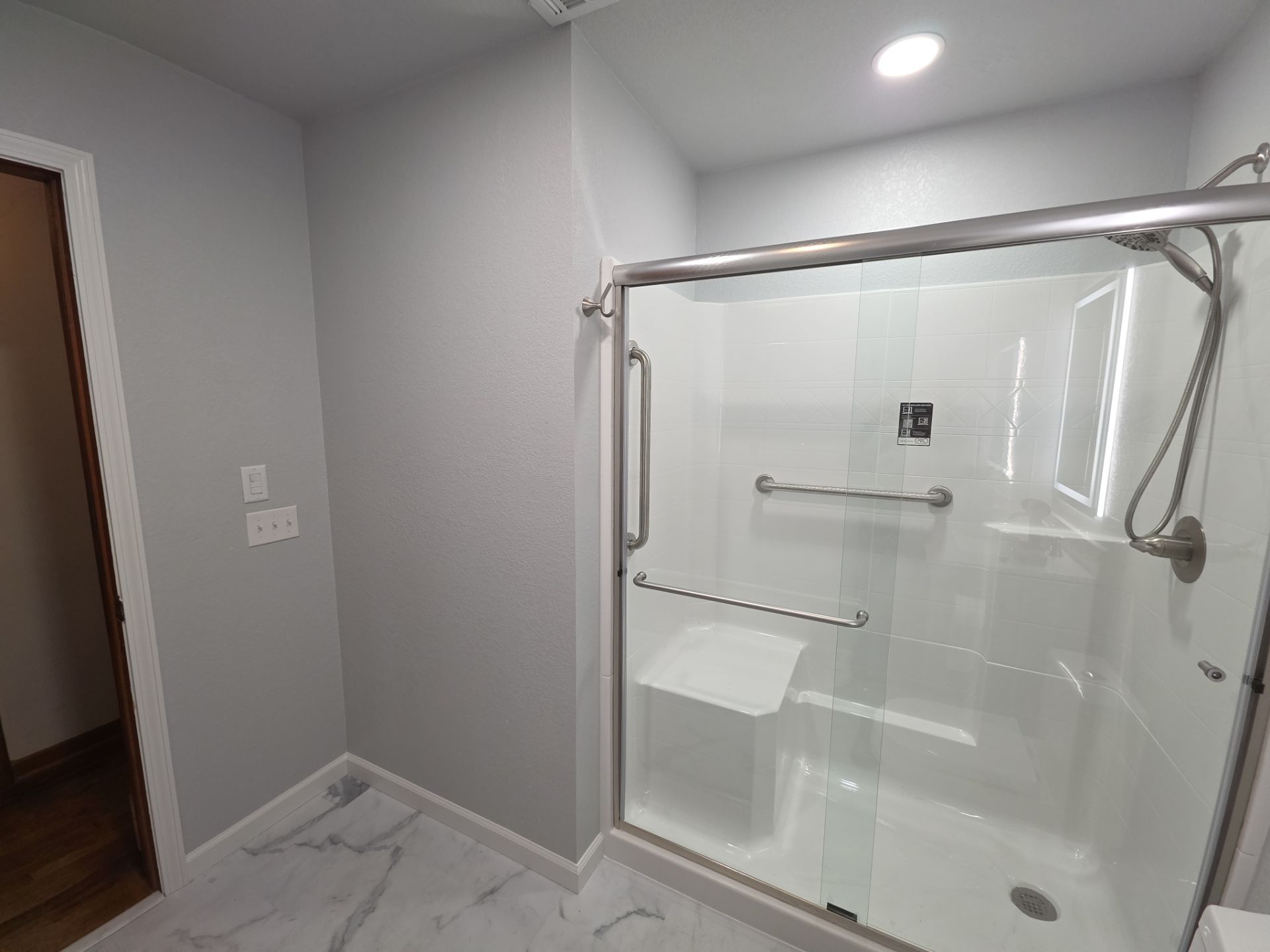 Bathroom remodel by In & Out Construction & Remodeling, LLC