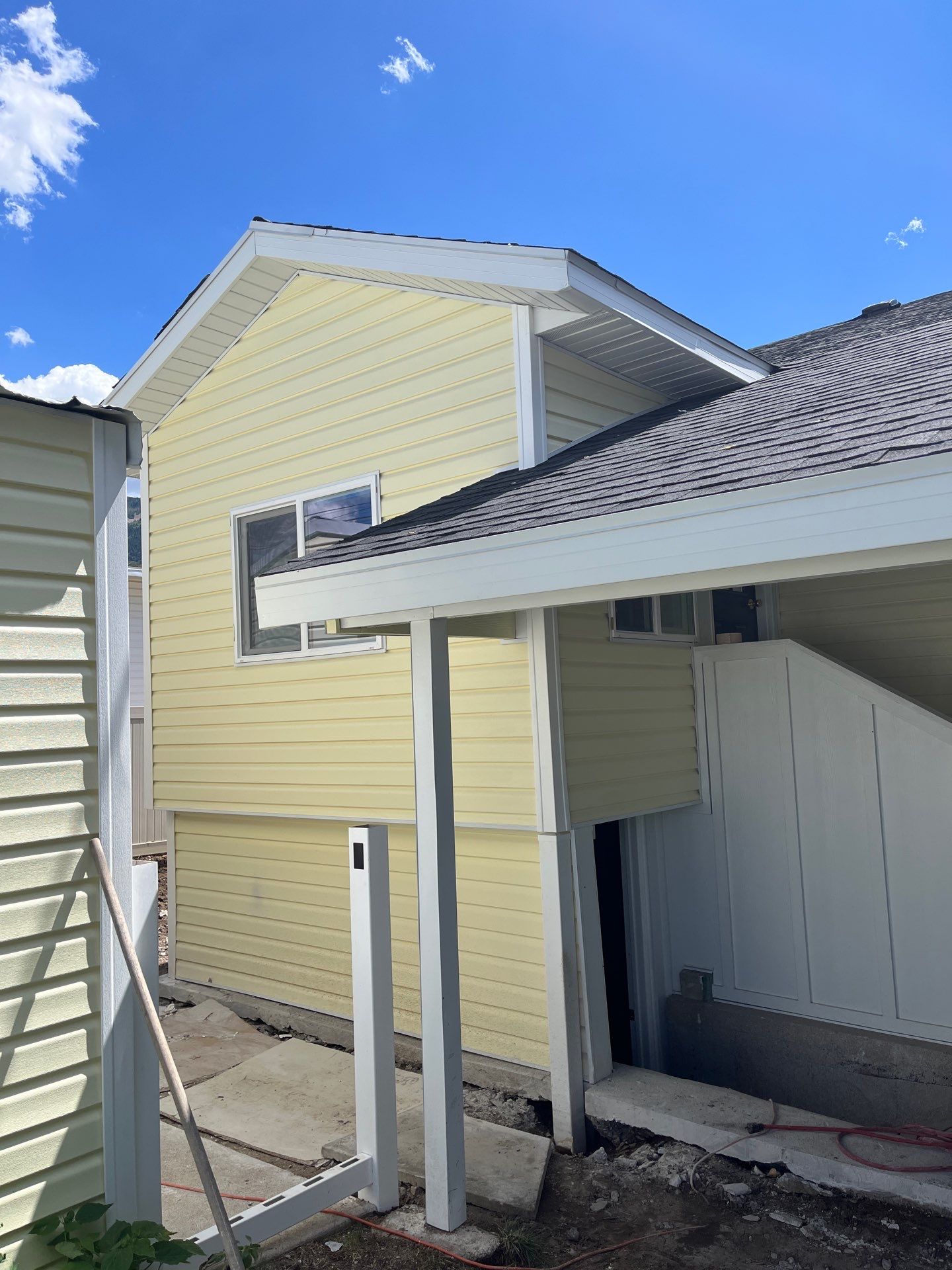 Tooele | Custom Color-Matched Vinyl & Hardie Upgrade | Colonial Yellow by Ideal Siding Utah