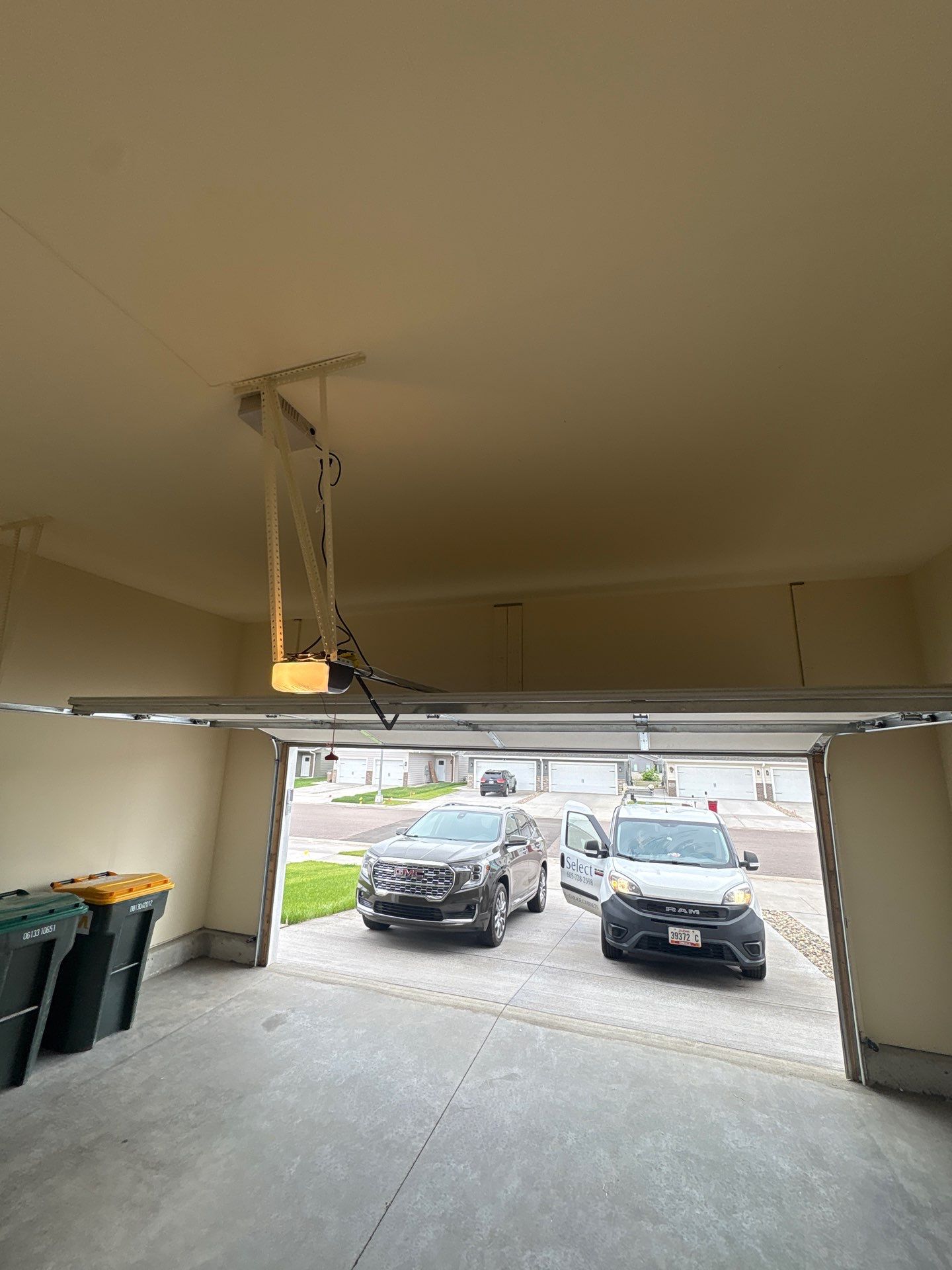 Garage Interior Finishing and Custom Wood Step Construction in Sioux Falls by Select Painting, Coatings & Garage Cabinets