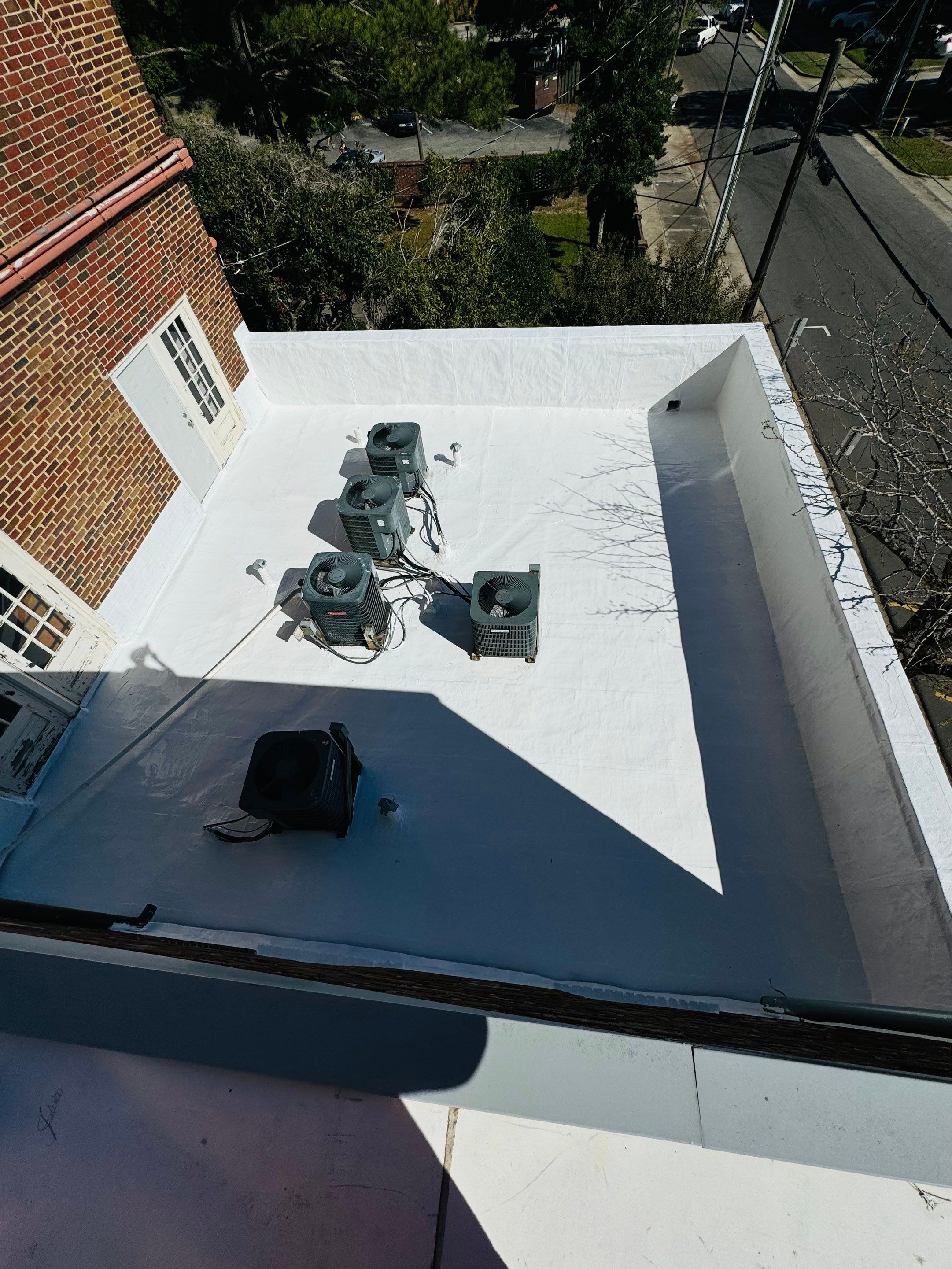 Commercial Roof Restoration – Kinston Hotel Apartments by S.W. Contracting & Consulting