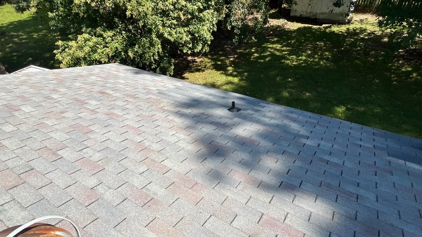 Chimney and Pipe Boot Flashing Roof Repair by Midlands Roofing & Exteriors